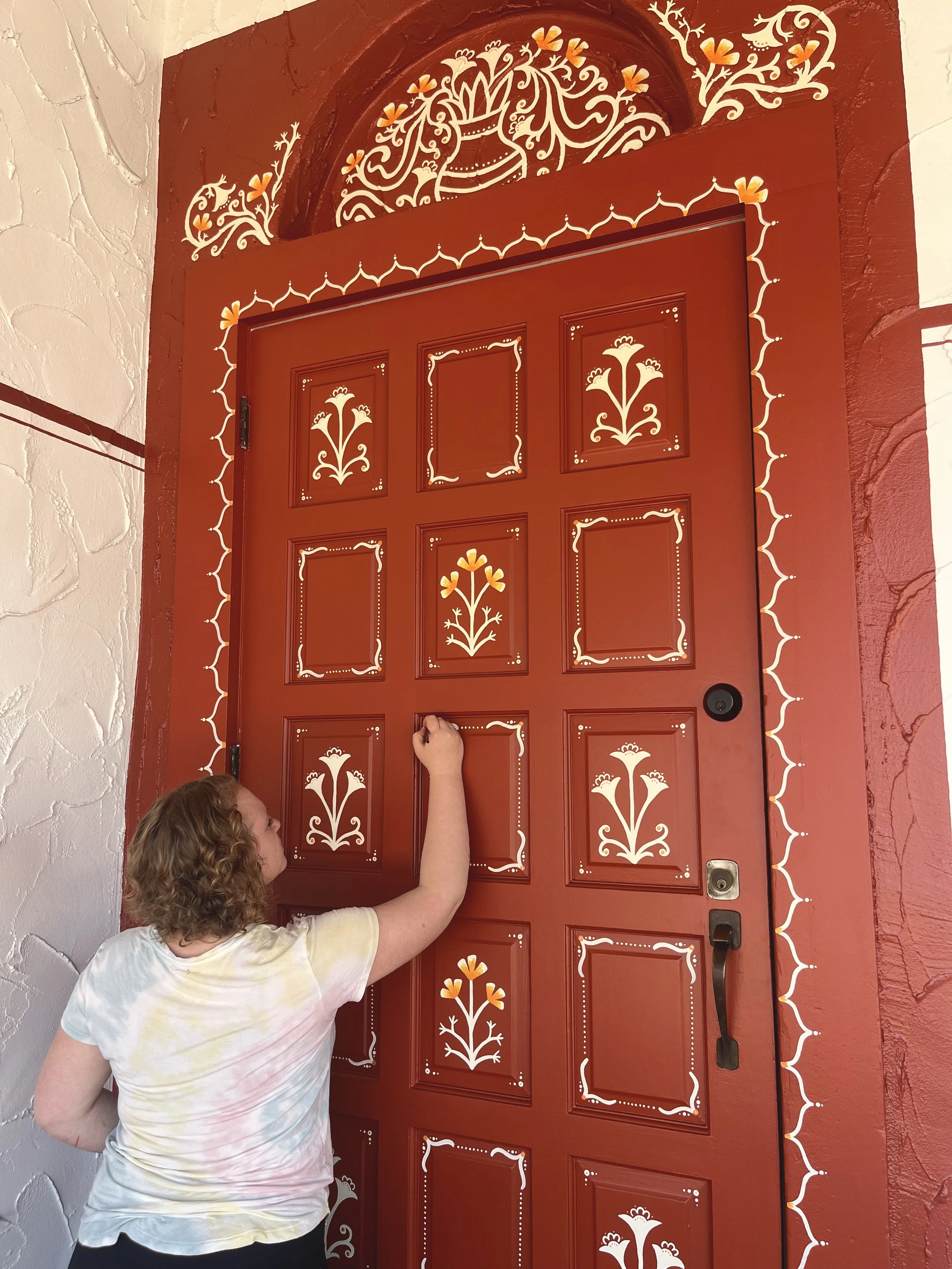 Southern indian restaurant mural art entry for placemaking and celebrating culture. Traditional architectural features and kolams. SF Bay Area mural artist interior design portfolio & inspiration.
