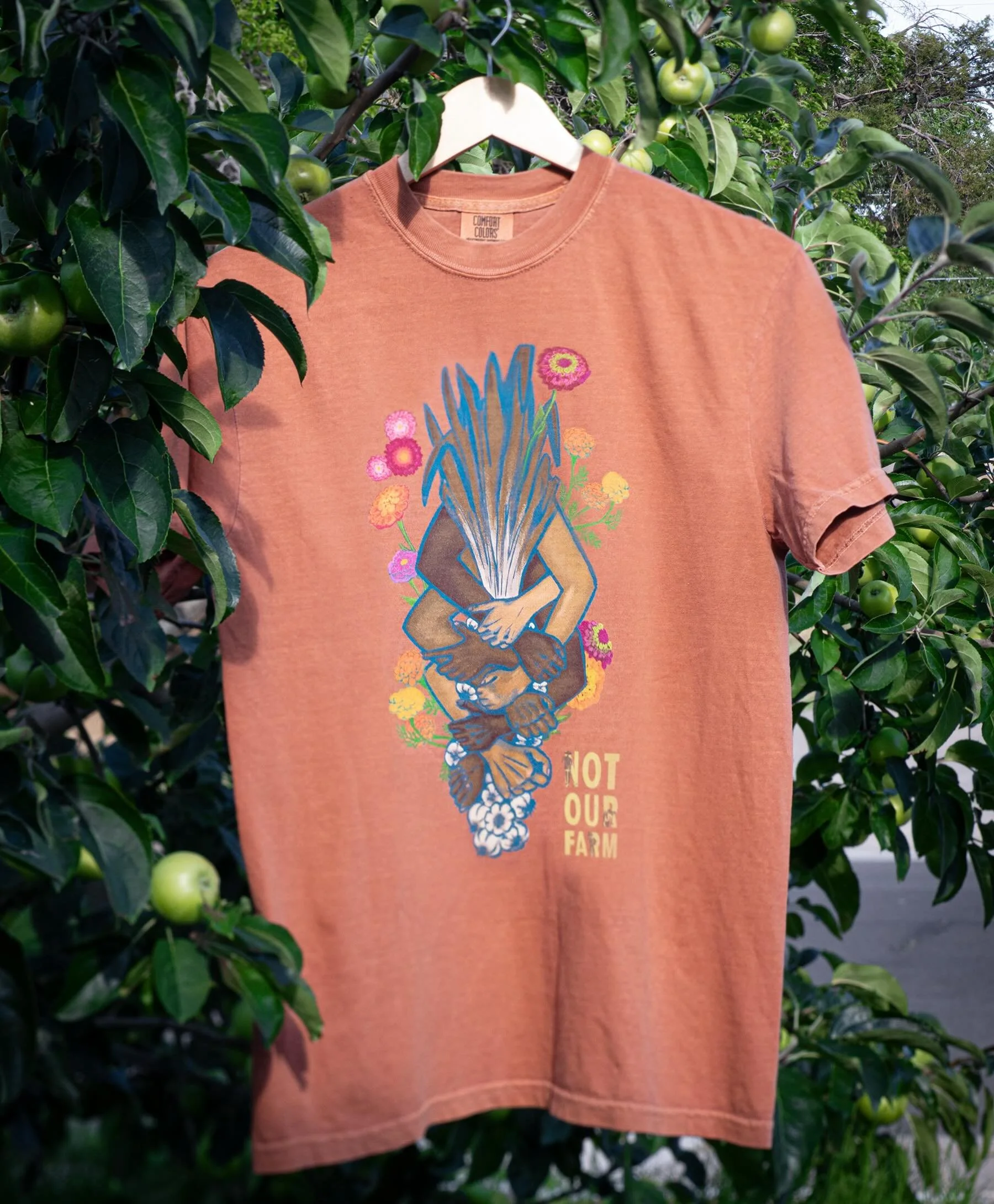 T-shirt fundraiser to benefit our Farmworker Emergency Fund!

We are really excited to announce that after 6 and a half years, we finally have Not Our Farm t-shirts for you! Over the years many of you have asked about NOF swag and we&rsquo;ve finally
