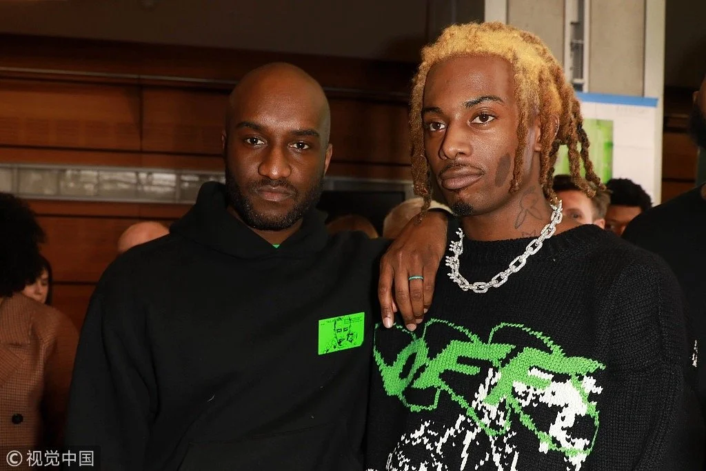 Rapper Playboi Carti (R) and Designer Virgil Abloh pose Backstage after the Off-White Menswear Fall/Winter 2019-2020 show as part of Paris Fashion Week, January 16, 2019, in Paris, France. /VCG Photo