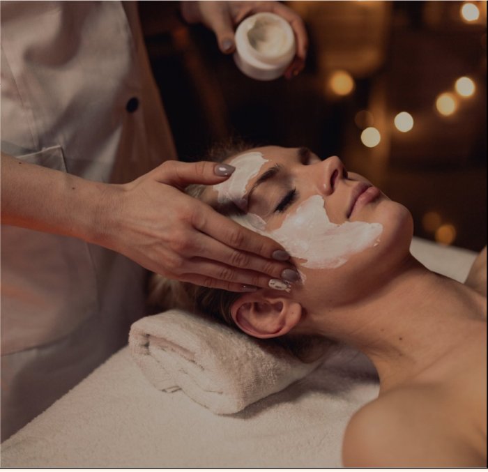 Woman receiving a facial at a new york city head spa