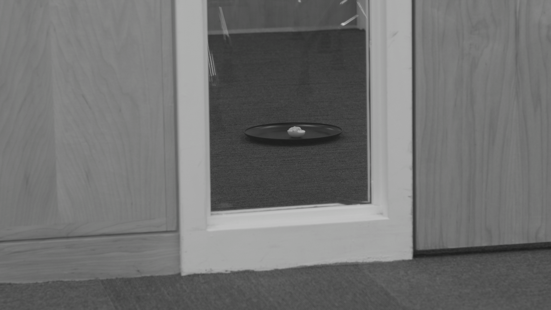 A man grapples with his shoulder angel and devil. Directed by Harold Tsui