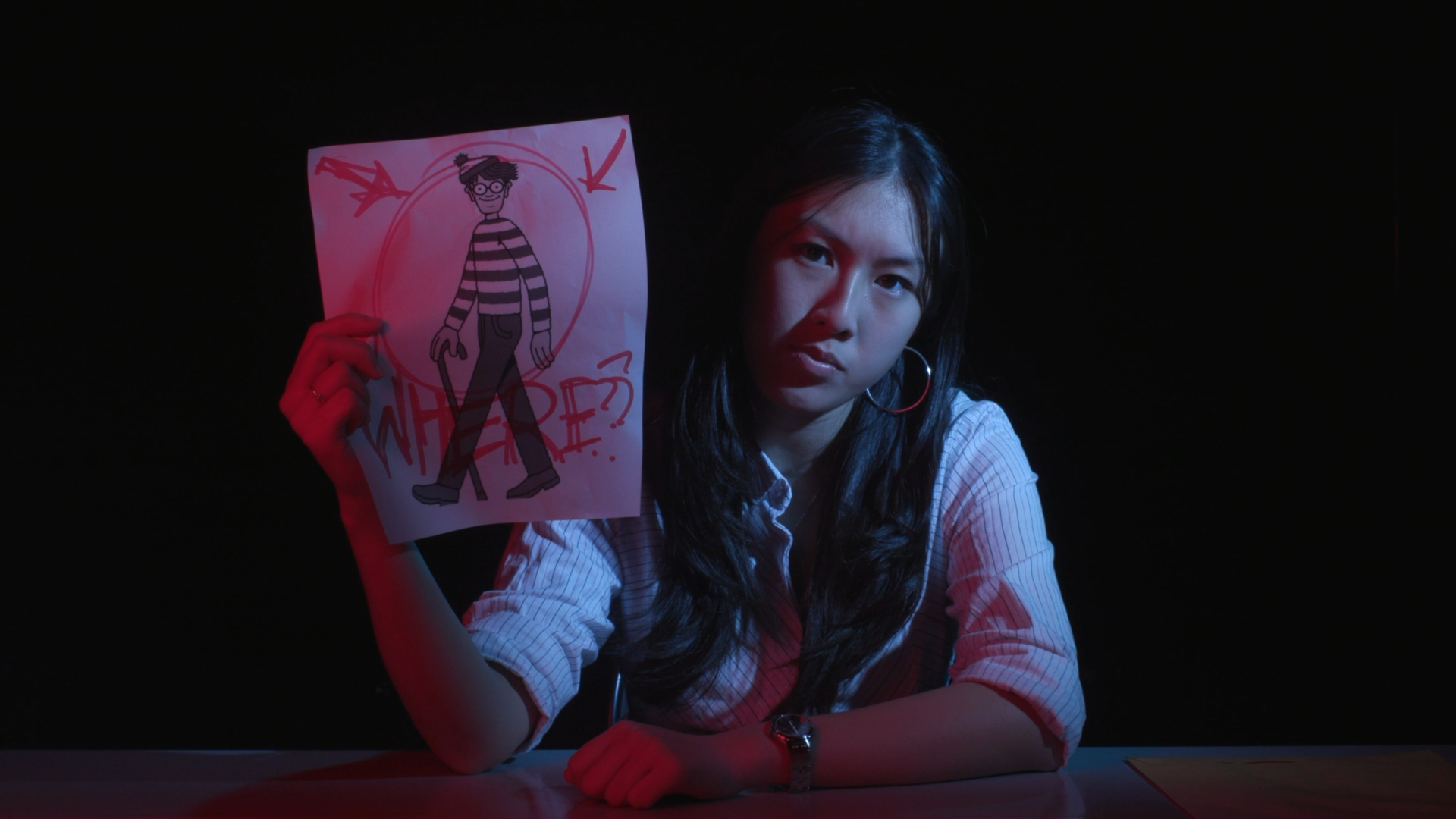 An interrogation takes an unexpected turn. Directed by Harold Tsui