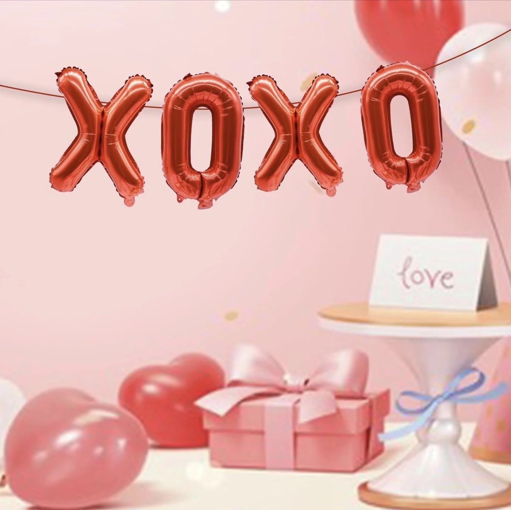 Red XOXO letter balloons for Valentine’s Day party décor and romantic event styling