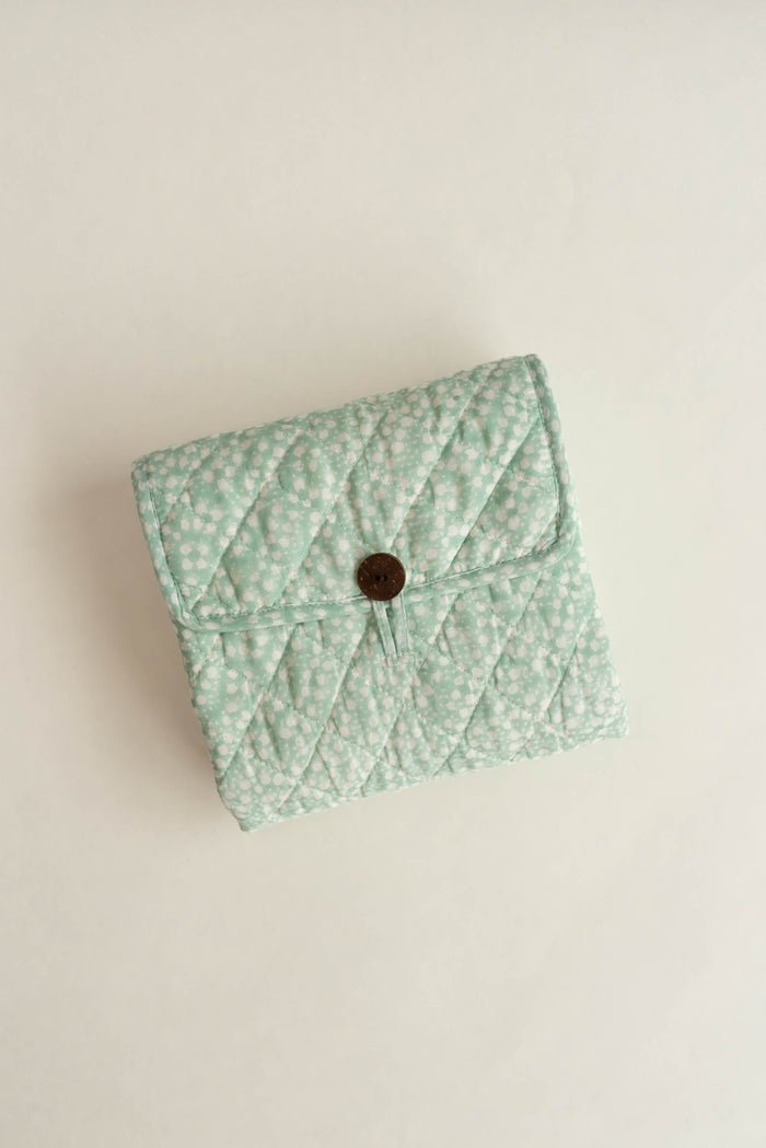 RaamaeBlockPrintedTravelChangingMat_PowderBlue_Moana_3.jpg