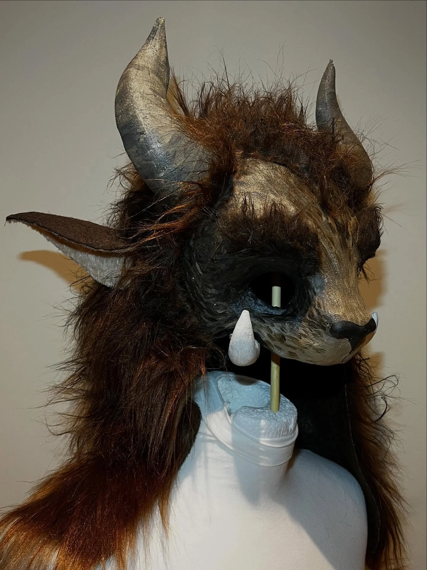 Beauty and the Beast mask. Made for the Wolvercote Players Christmas pantomime. 
/
/
/
Mask base sculpted from clay, worbla formed over the top. Horns pattern cut from plastazode foam.