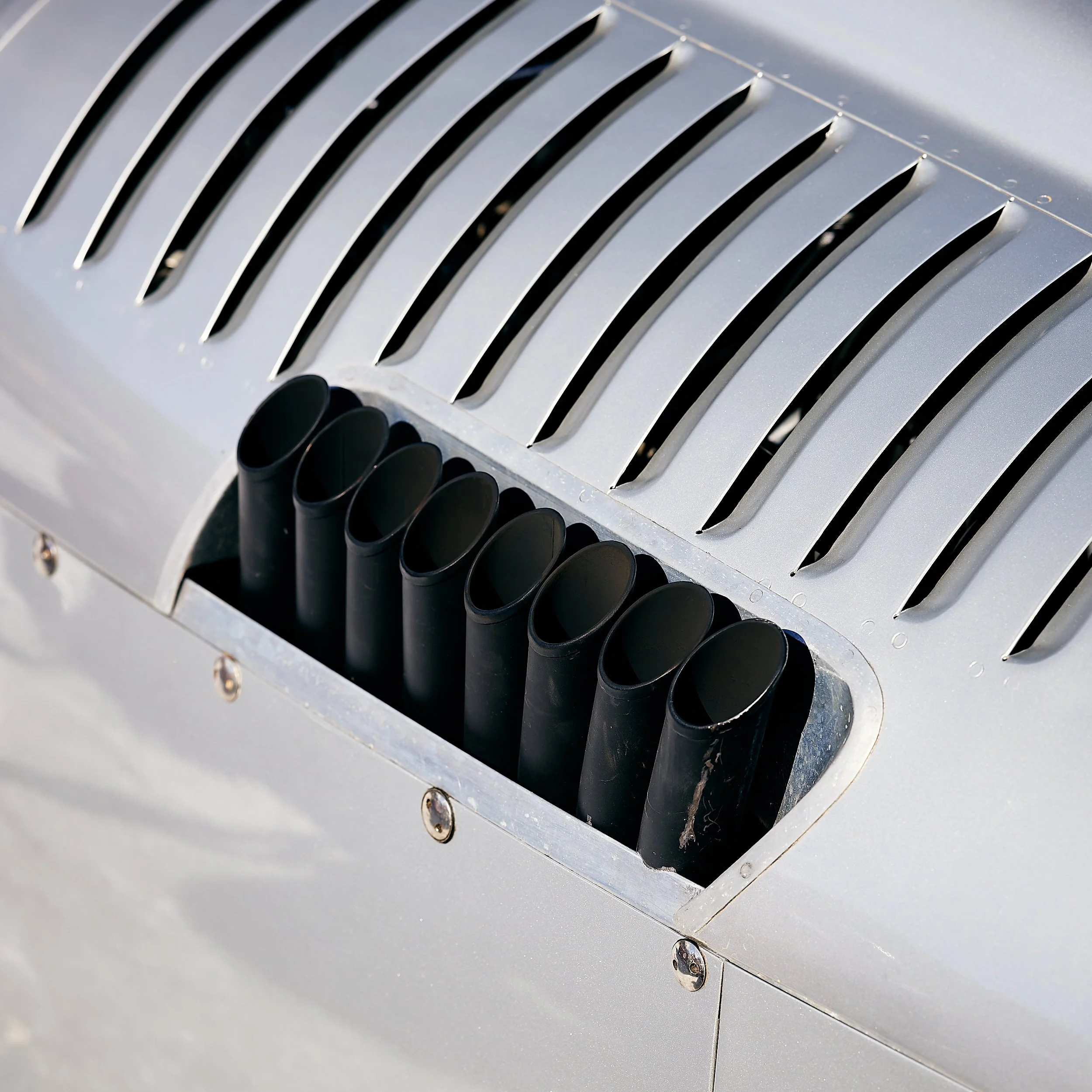 Close-up of a Mercedes Benz race car exhaust