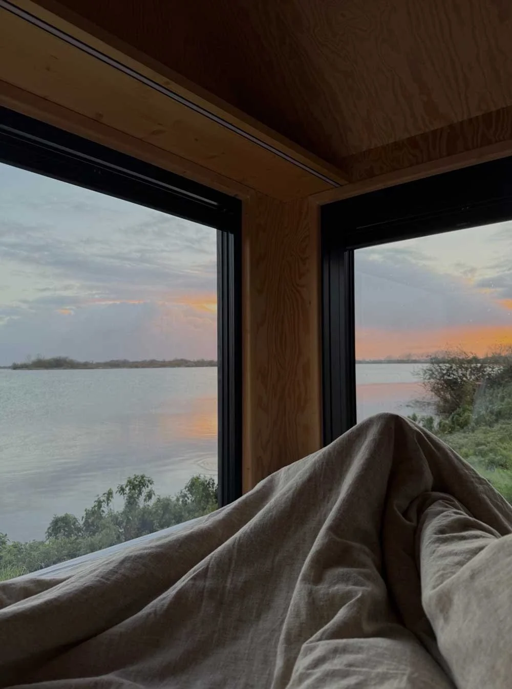 TerraCabins - View over the river from the bed.jpg