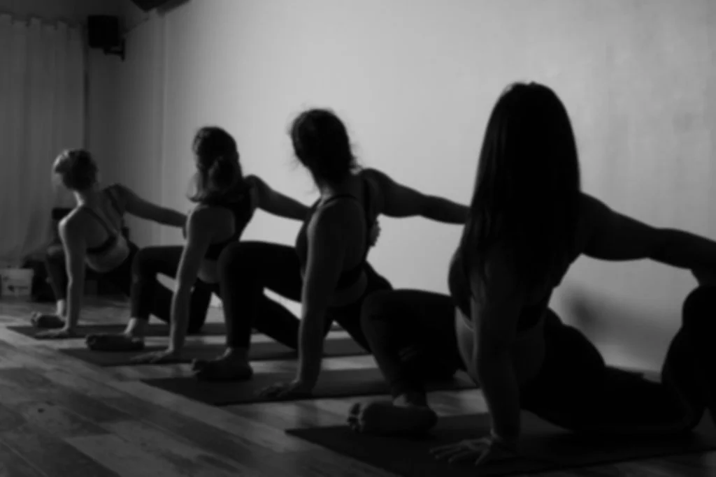4 women in a yoga flow