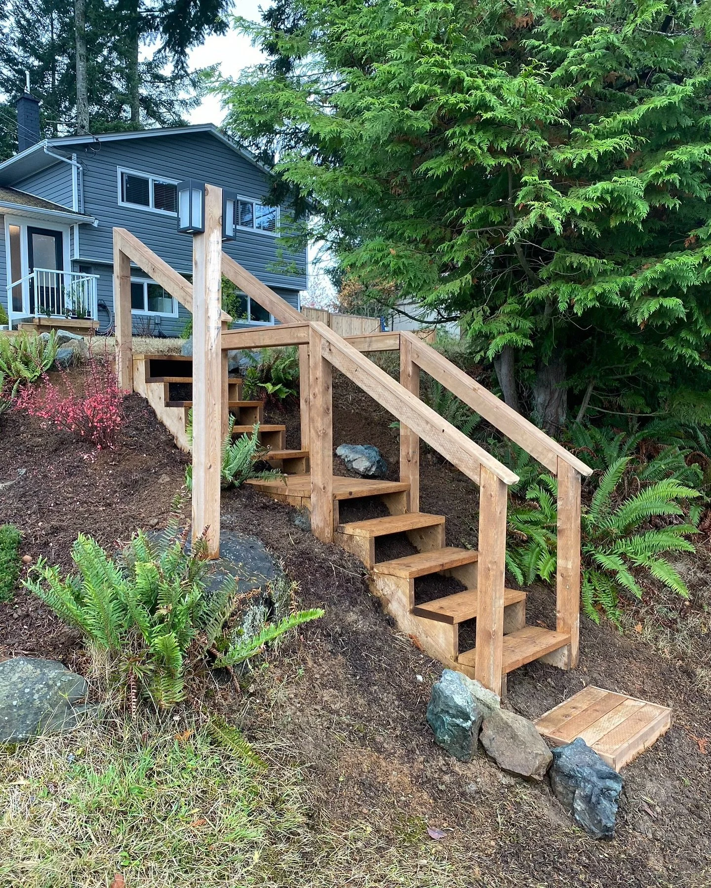 Project complete 🛠️
I enjoyed building these outdoor stairs to make a sloped driveway easier to navigate in the winter 😎 (will be adding non slip tread) .., let me know what you think ! 

(Last 2 pics are before and during) 🛠️

#nanaimohandyman #v