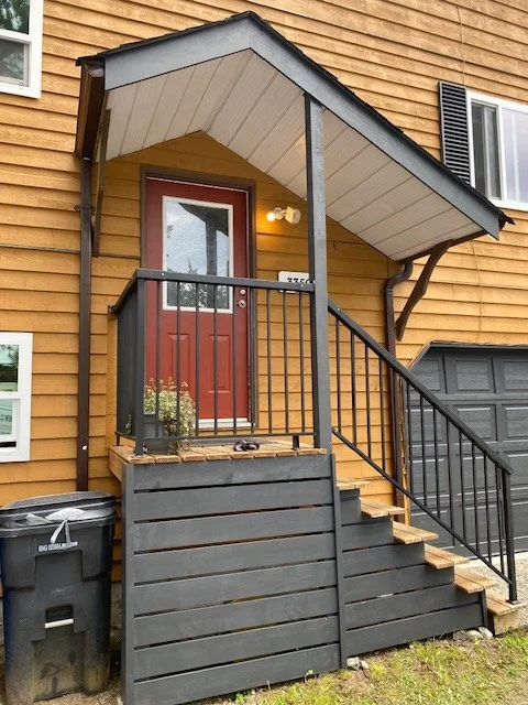 This front entrance is looking much better and is more functional after creating a covered storage space as well as new steps. What do you think? 

#renthehandyman #vancouverislandhandyman #nanaimohandyman #nanaimoBC #nanaimohomerenovations