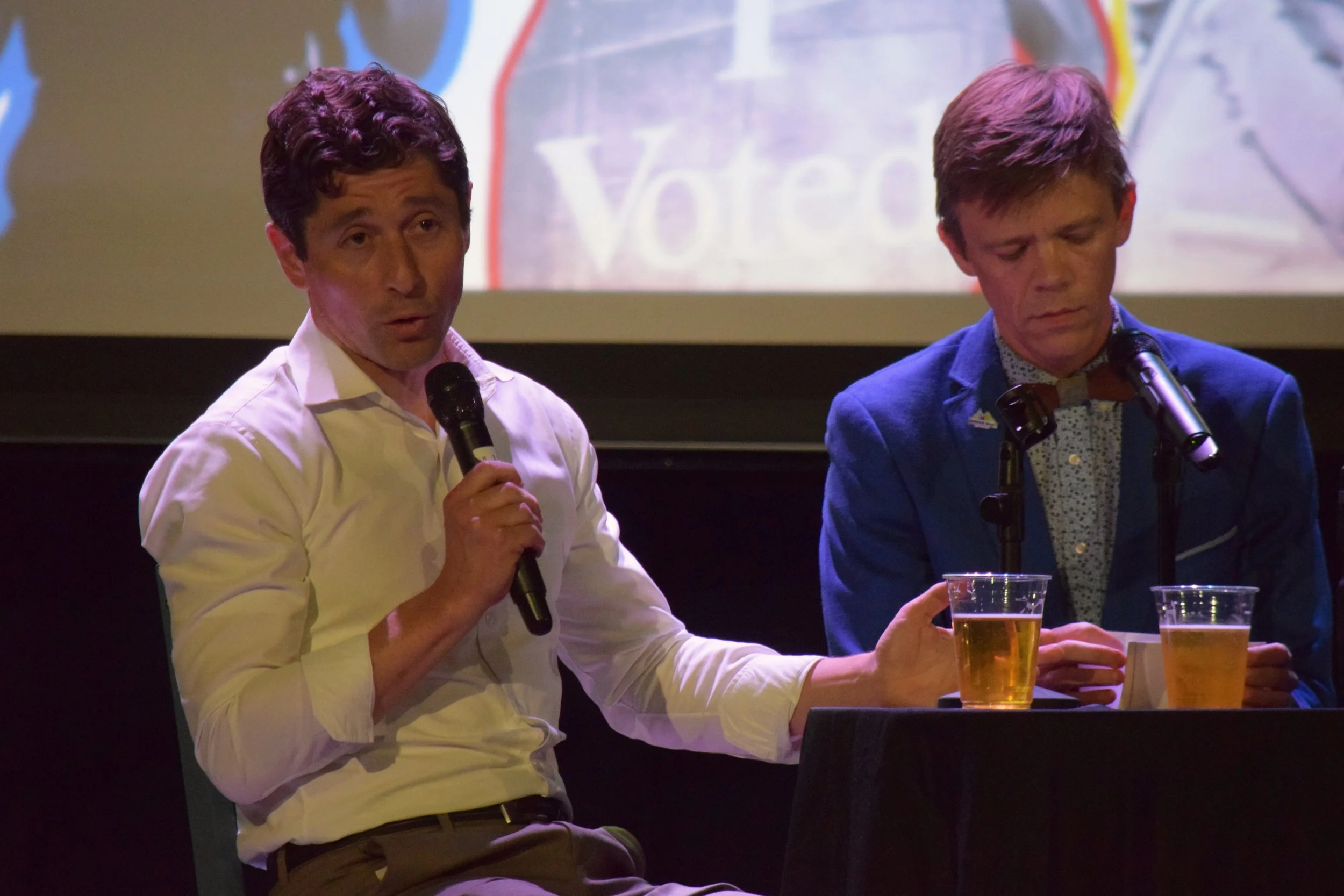  Mayor Jacob Frey (left) speaking onstage next to Tane Danger (right) 