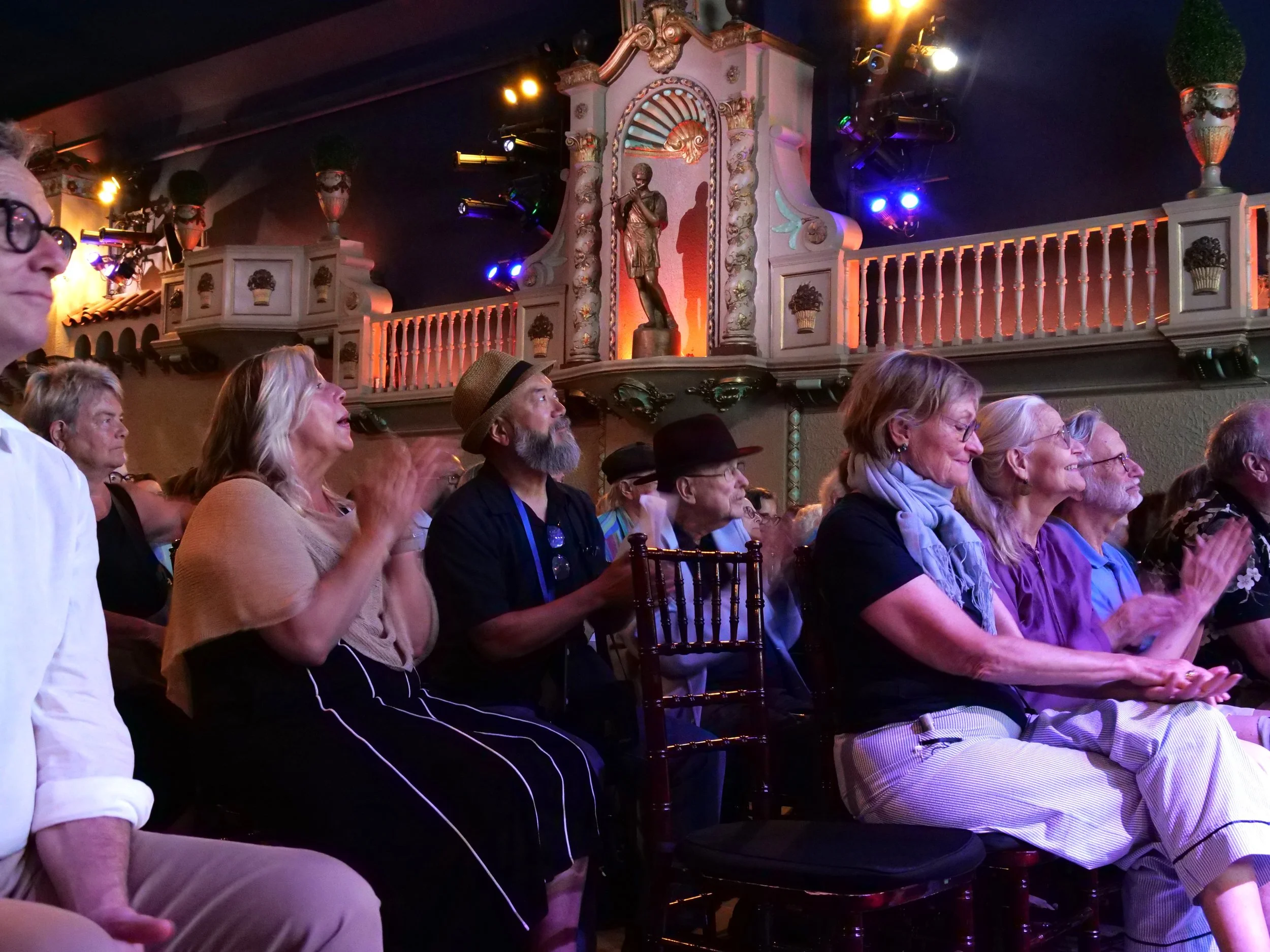  Audience members enjoying  The Theater of Public Policy . 