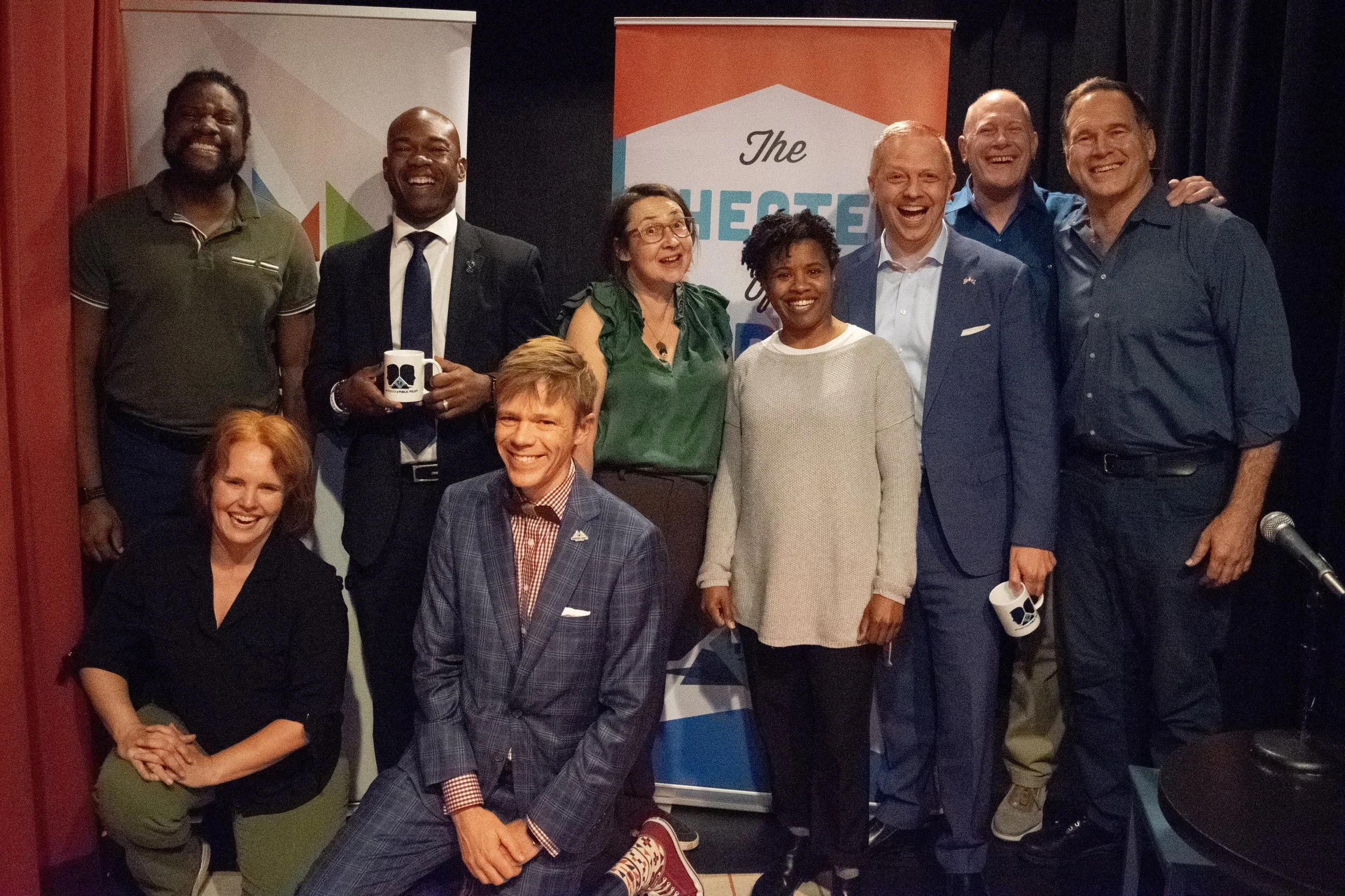 Back (left to right): Denzel Belin, Rep. Cedrick Frazier, Carmen O’Halloran, Alexis Camille, Anders Folk, Dennis Curley, and Jim Robinson  Front (left to right): Heather Meyer, Tane Danger 