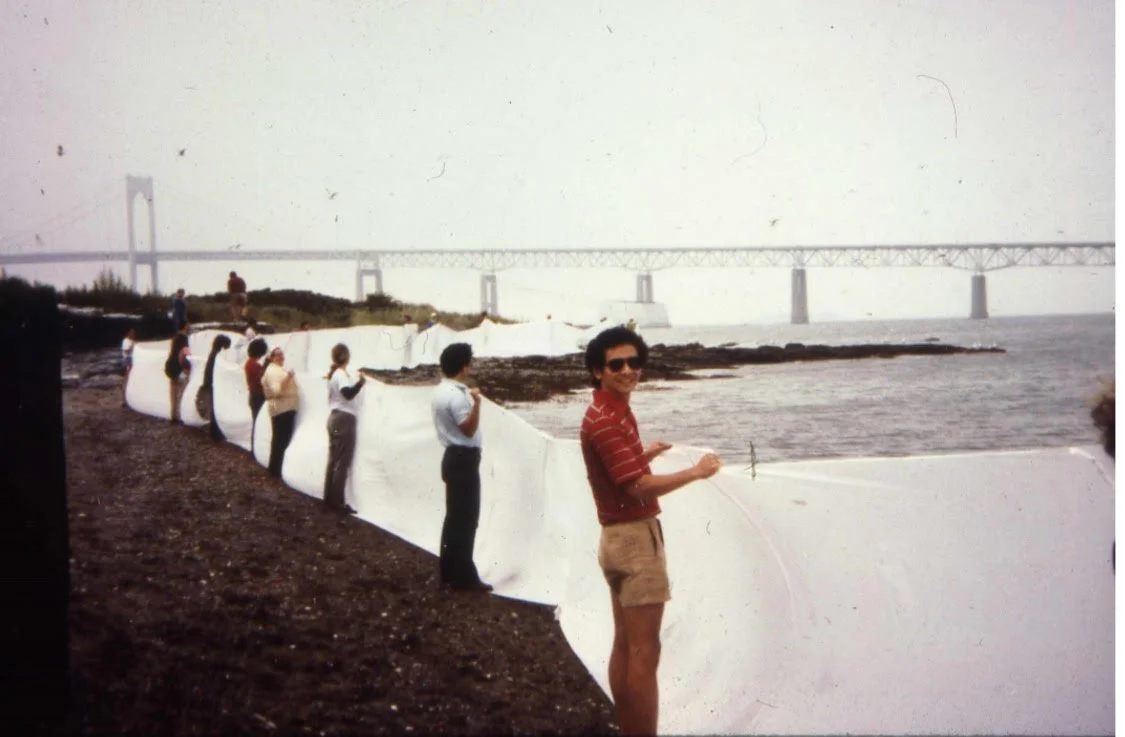 On this day in Rose Island history&hellip;
July 6, 1985: Dozens of Rhode Islanders wrapped Rose Island in a 3,500-foot-long chain of bedsheets to protest a proposed marina and condo development. Led by local resident Charlotte Johnson, the unusual de