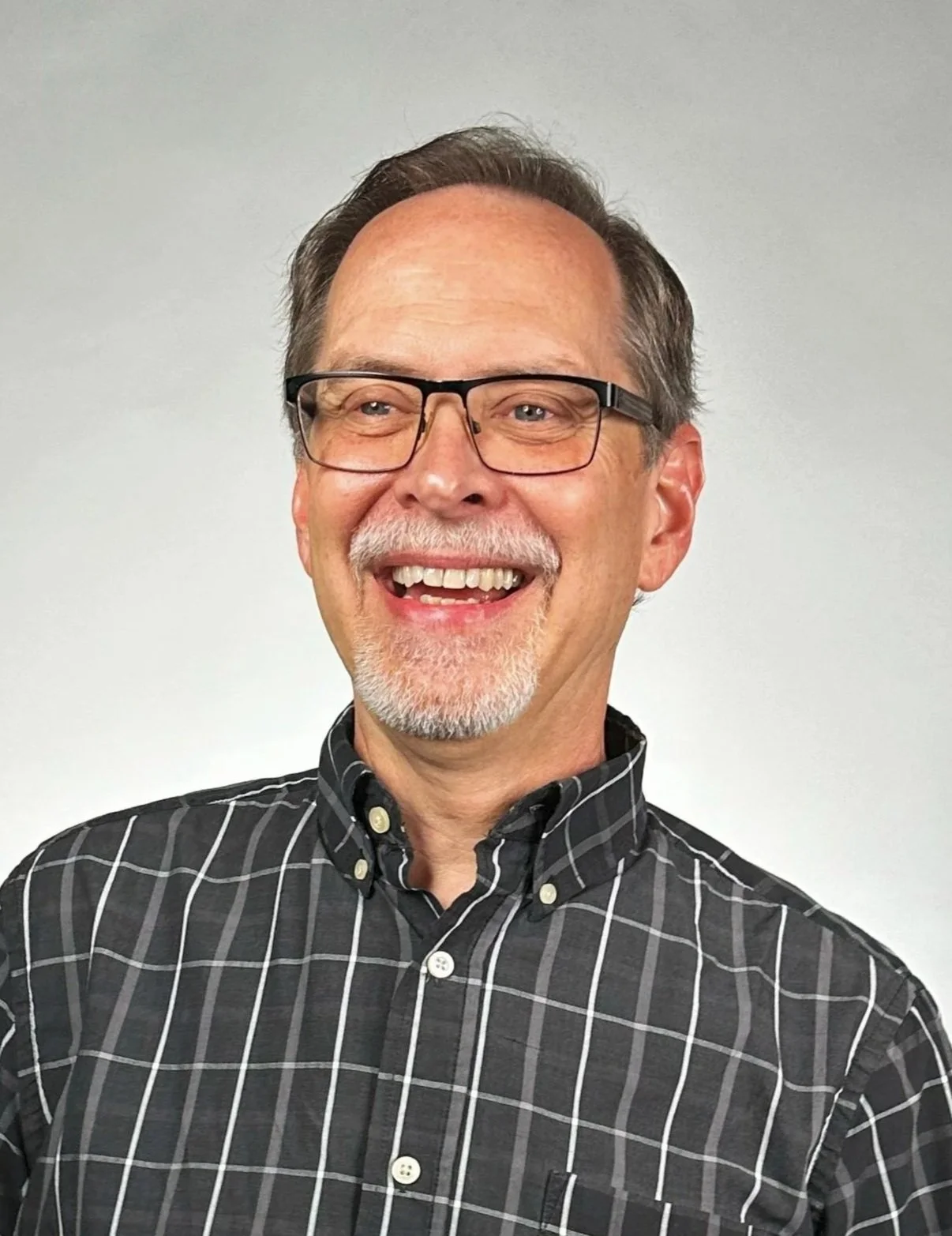 Staff photo Cris fun.jpg