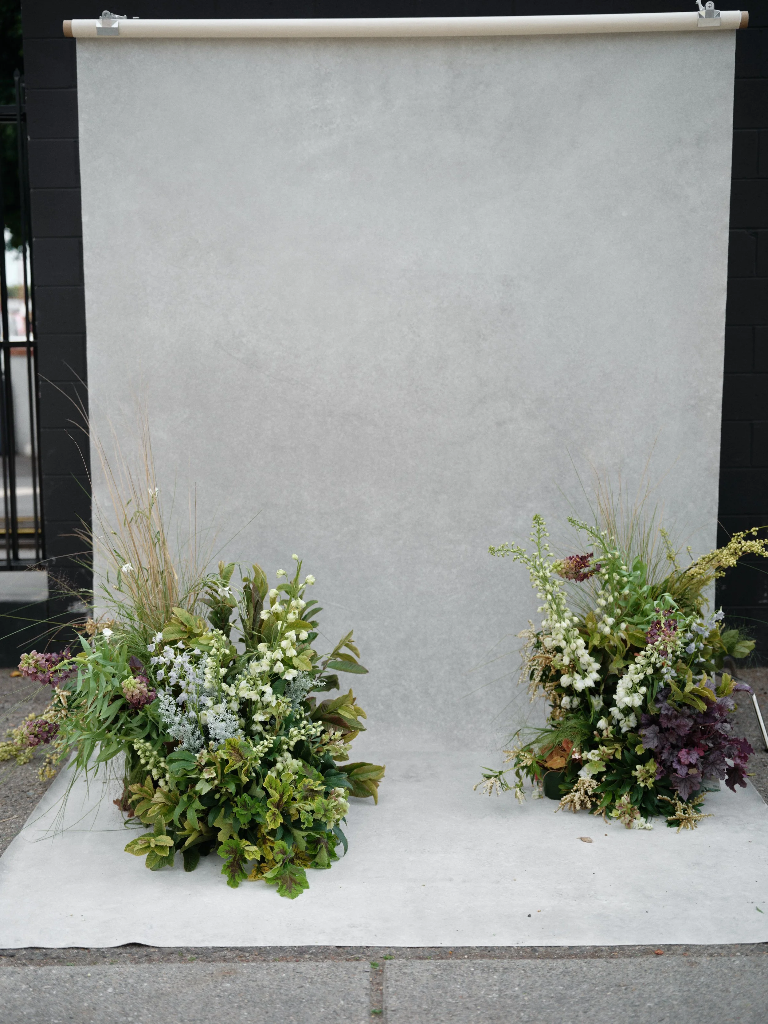 Chasing Stone Sandstone hand-painted canvas backdrop with botanical floral arrangements for portrait photography