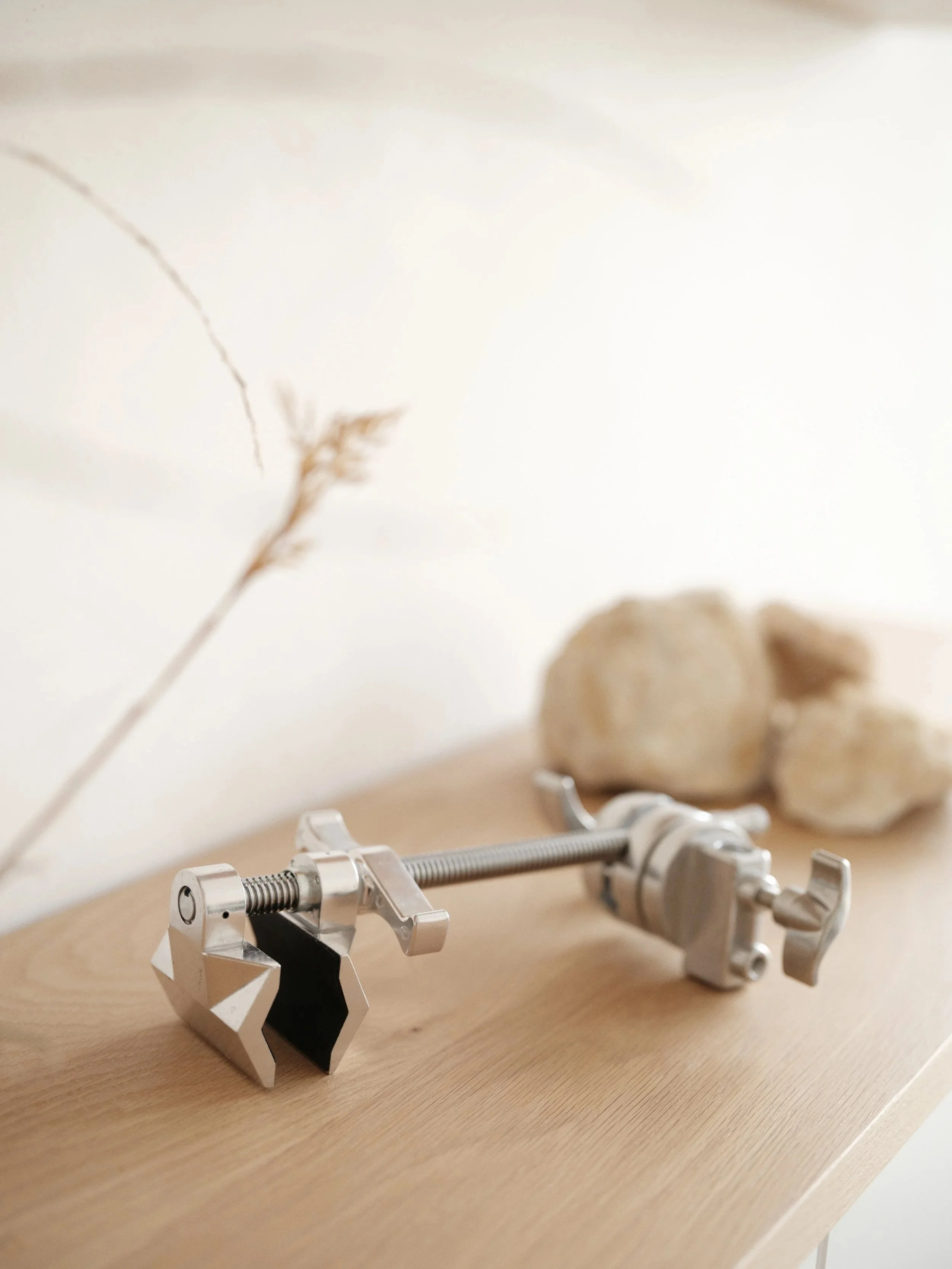 Chasing Stone floating backdrop adapter mount on wooden surface