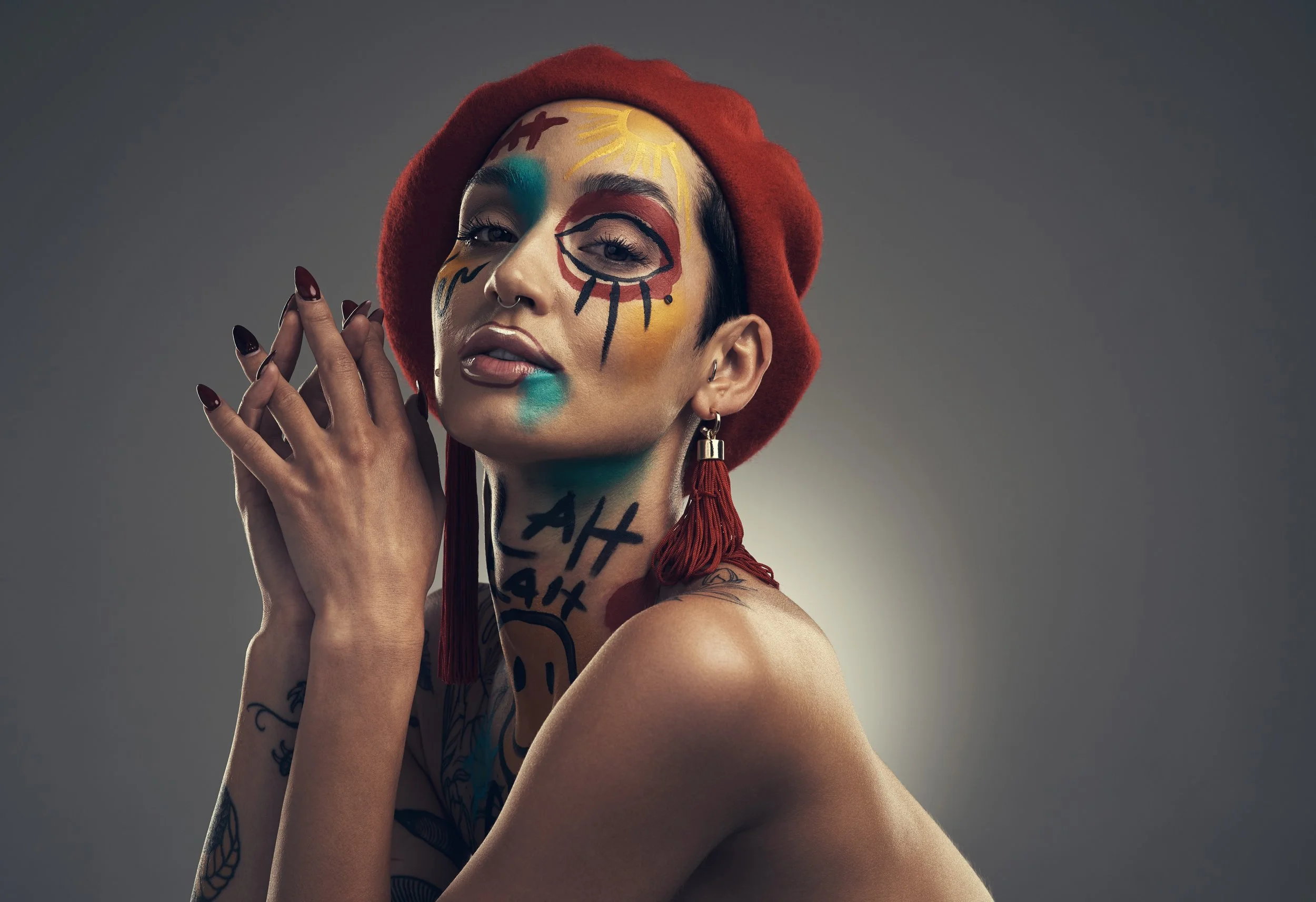 studio-shot-of-a-young-woman-posing-with-paint-on-2025-04-06-08-29-18-utc.jpg