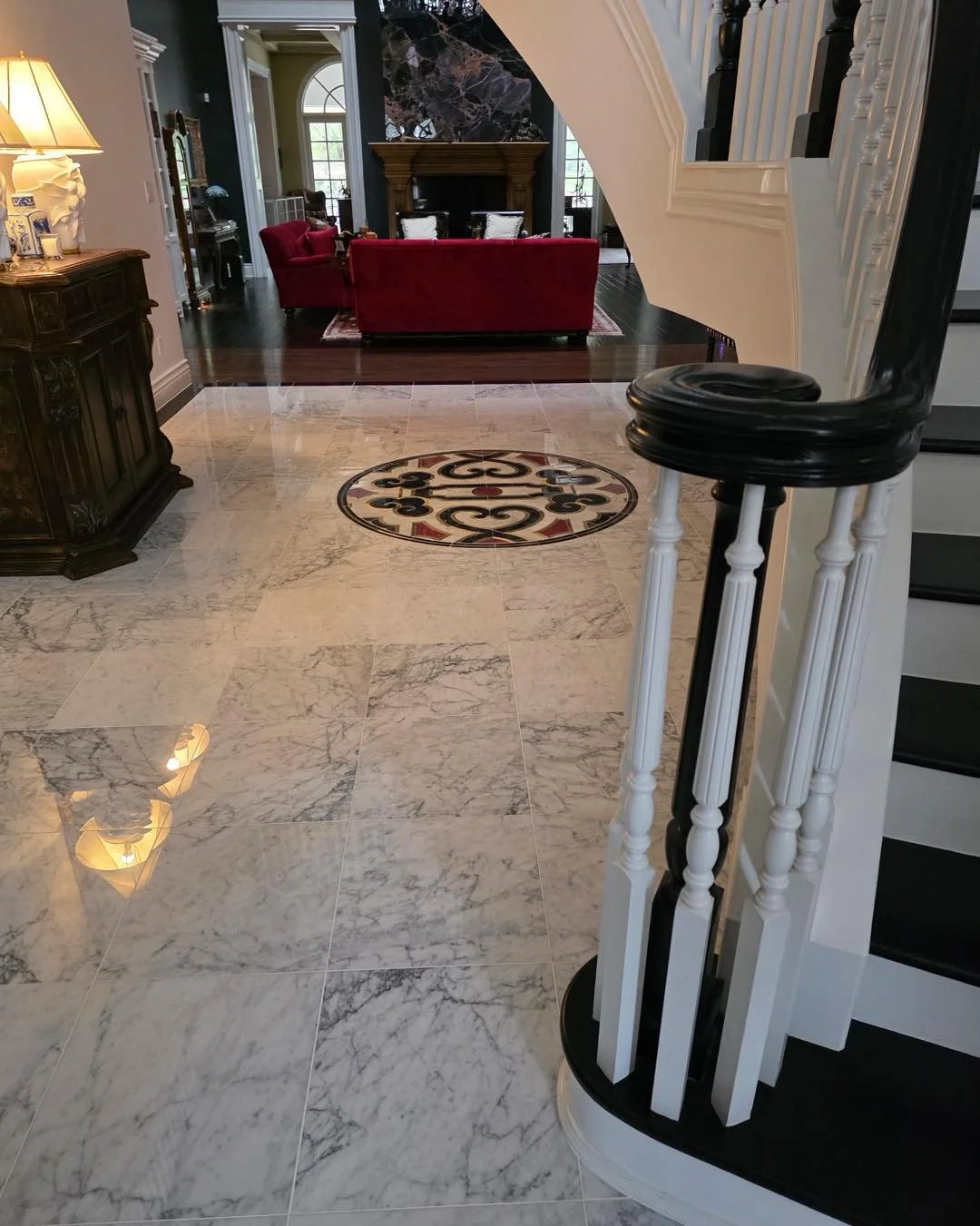 Well, this Foyer went from plain old dark wood floor to a fabulous Carrera Marble with a custom marble and glass Medallion insert. It really made for  a dramatic stunning  look. My guys do such a great job.  #magnumopus #carreramarble #custommedallio