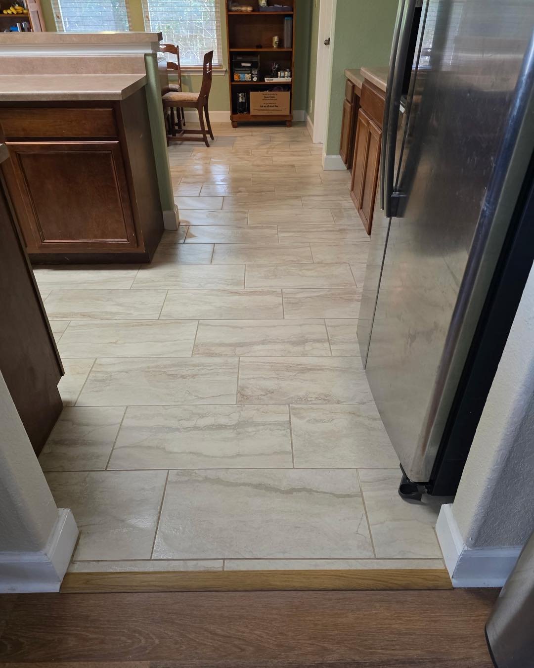 Lovely linear 12x24 porcelain tiles in warm organic colors. They were perfect for this house and customer loved them. 🥰