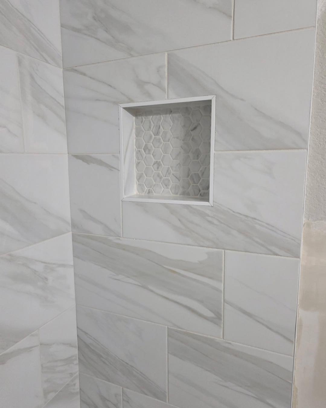 Shower make over, Carrera Marble look in porcelain tile with linear drain at front. Happy Clients. 😍