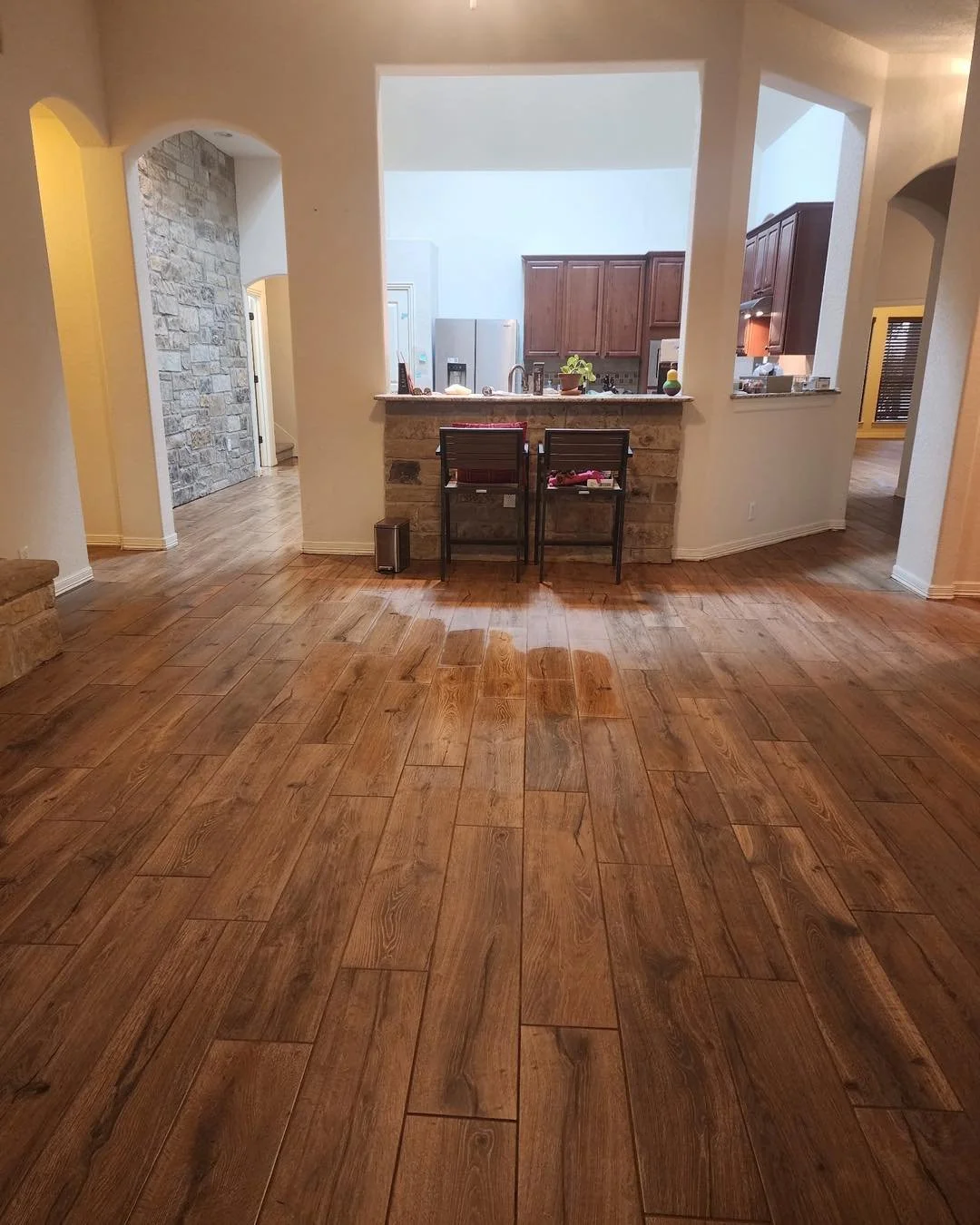 Durable attractive wood image porcelain tile planks. Almost destructive proof!! People are just loving them. ❤️