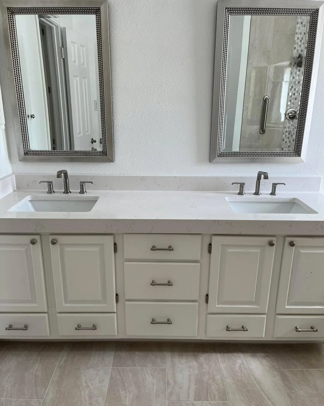 #remodeling ##shower #tile Another bathroom remodel using more organic colors. We managed to give the homeowners an extra foot in their shower making it larger. We used stylish penny rounds on the shower floor. We&rsquo;ve installed quartz countertop
