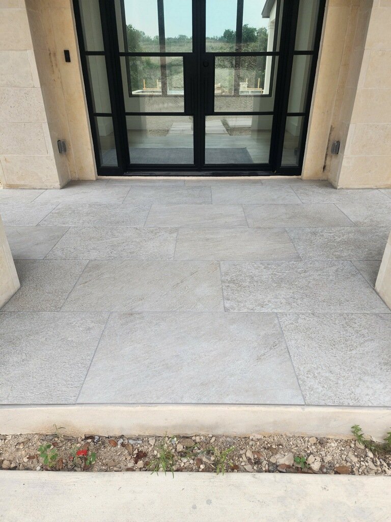 Large 24x36" Porcelain Tiles with rough surface for outdoor living.