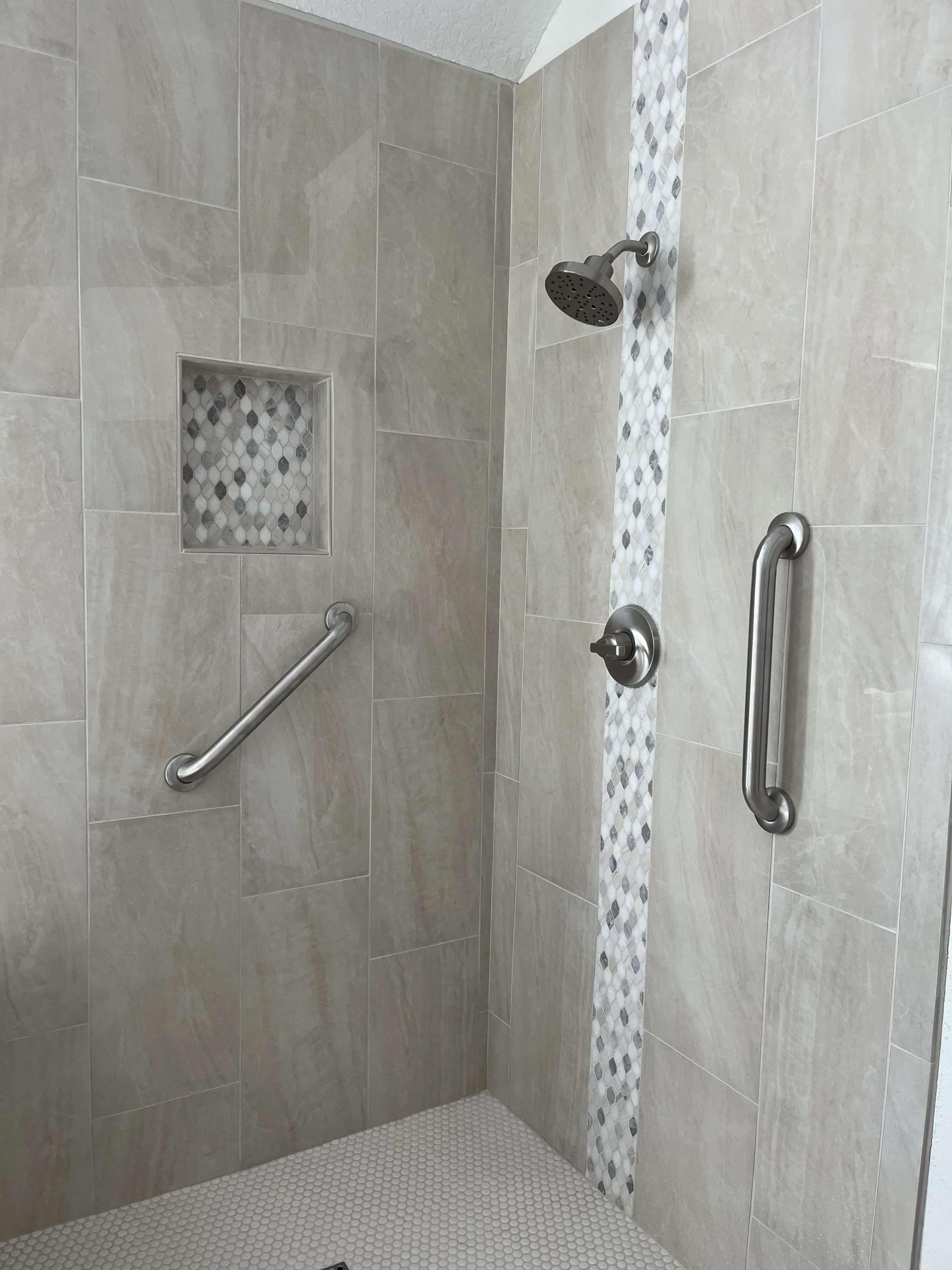 12x24 polished wall tiles Spa Look Praira, natural stone waterfall on faucet wall.