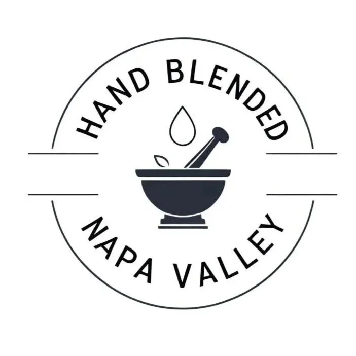 Wordmark with icon logo of mortar & pestle and words Hand Blended Napa Valley