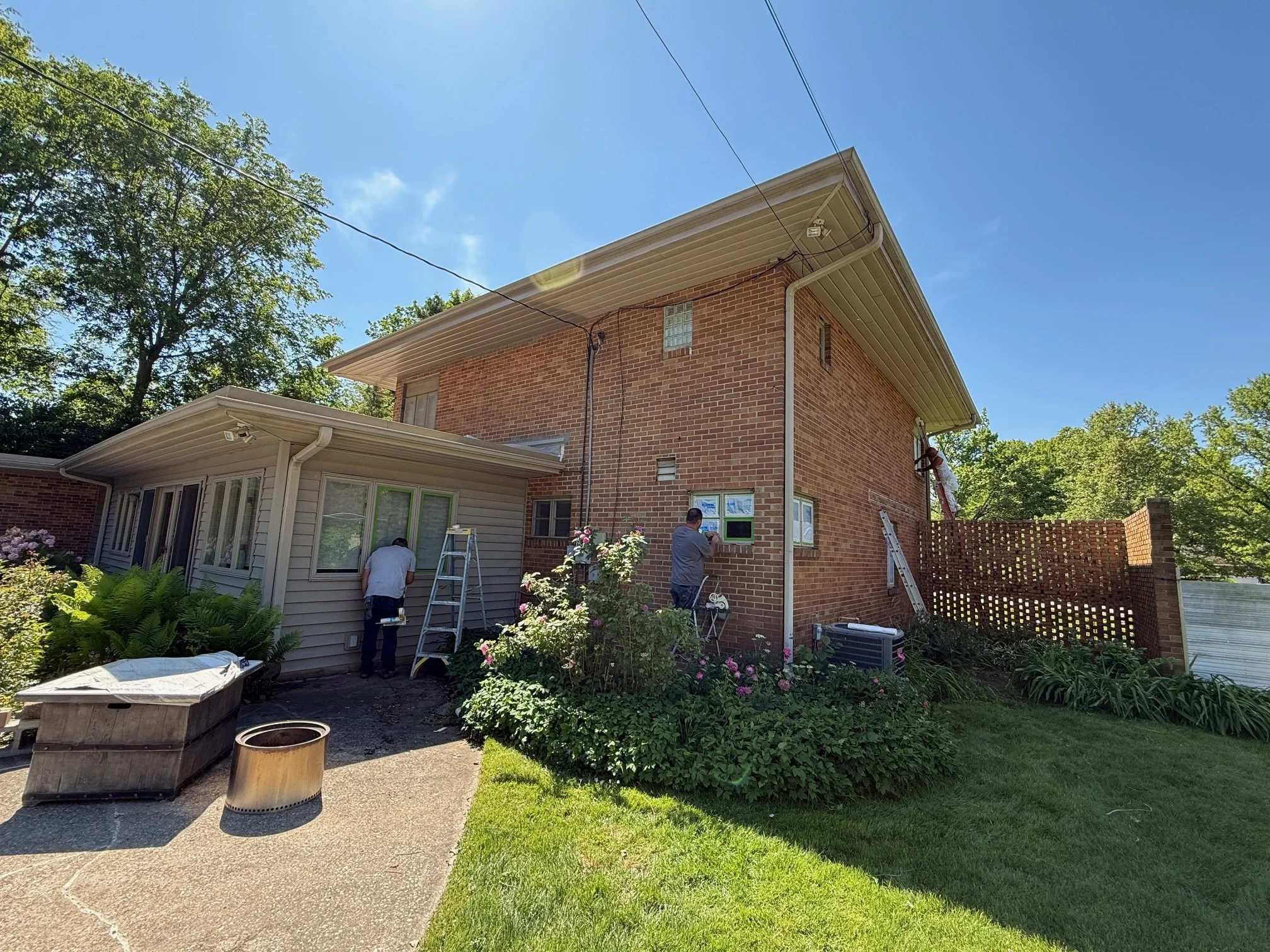 Painted brick home in South Bend after an exterior color update