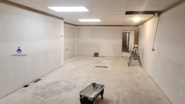 Interior drywall walls prepared with joint compound before painting.