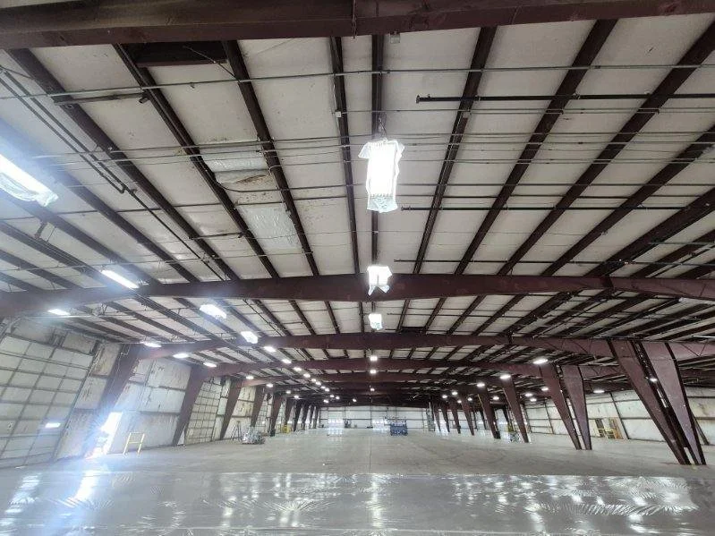 Drywall finishing preparation in a commercial facility in Goshen