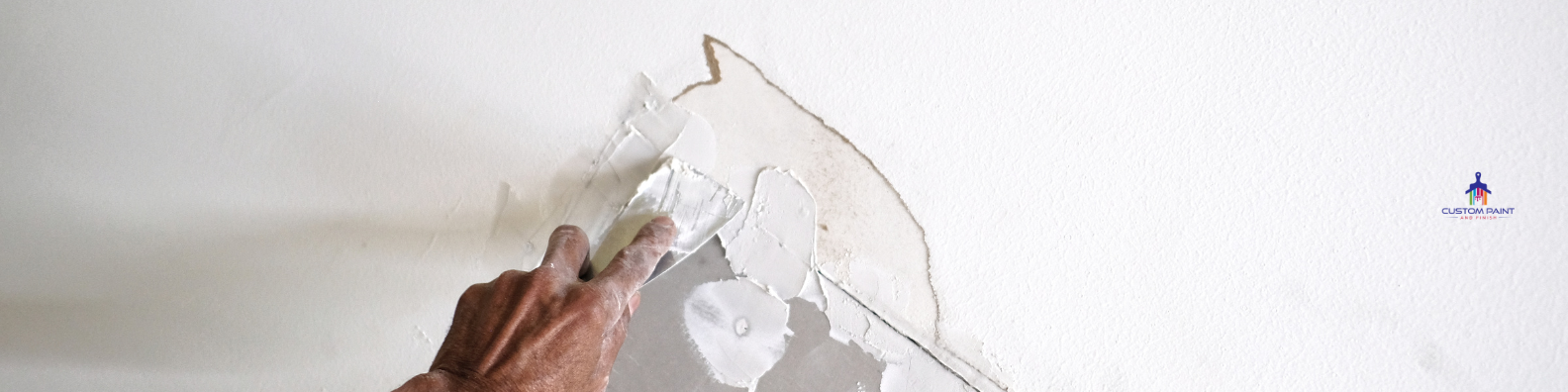 Drywall surface being repaired and prepared for finishing