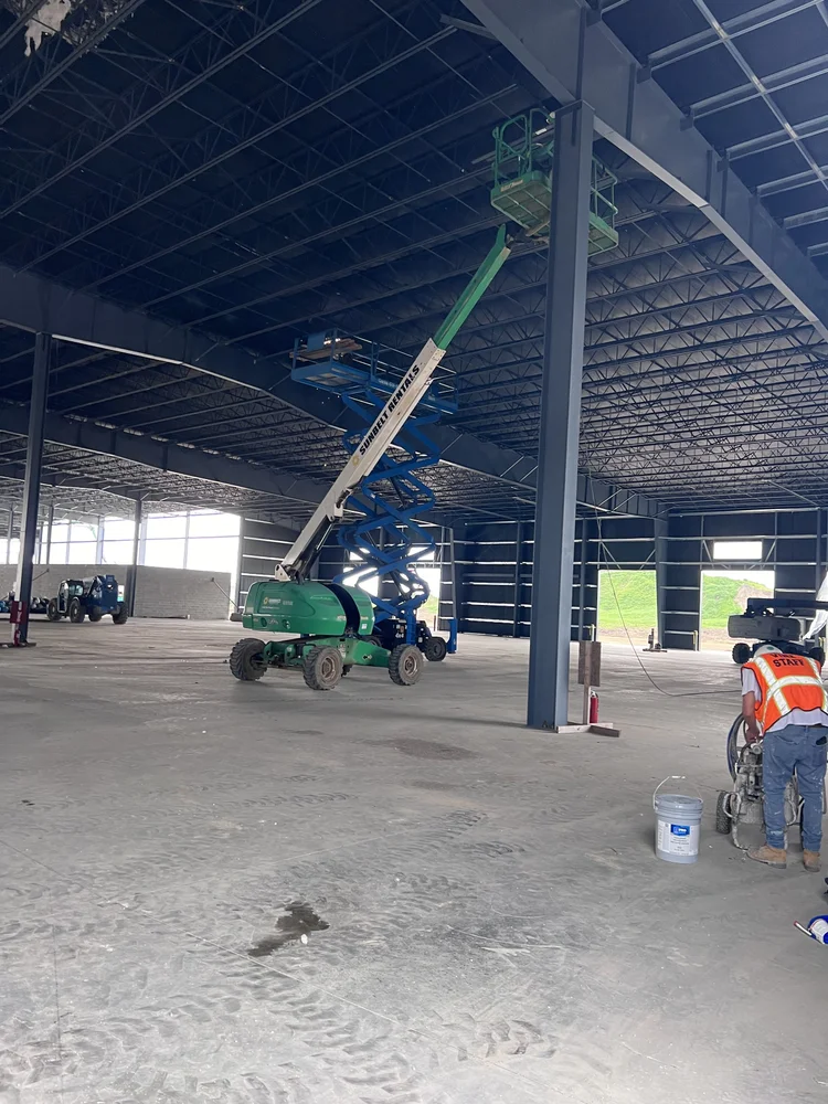 Industrial painting and protective coatings in a facility