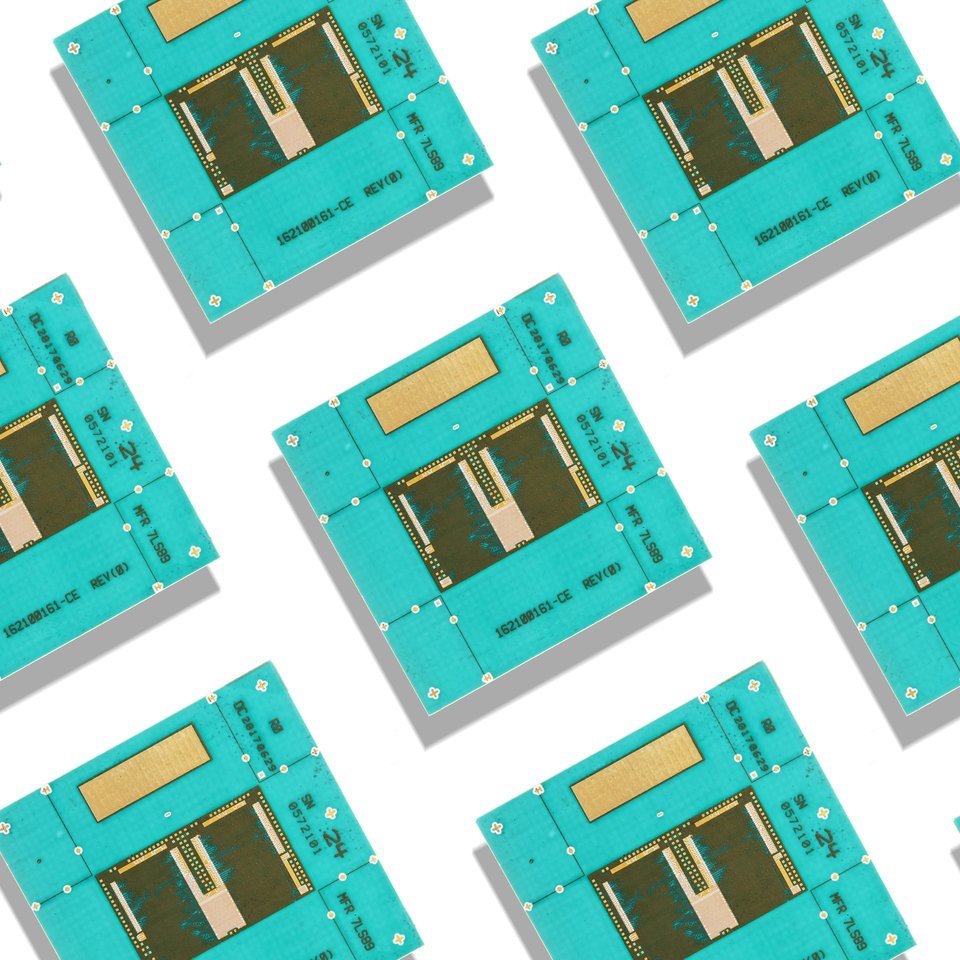 Advertising medical device product photography of multiple electronic circuit boards arranged in a pattern, each with a small rectangular chip and various small components.