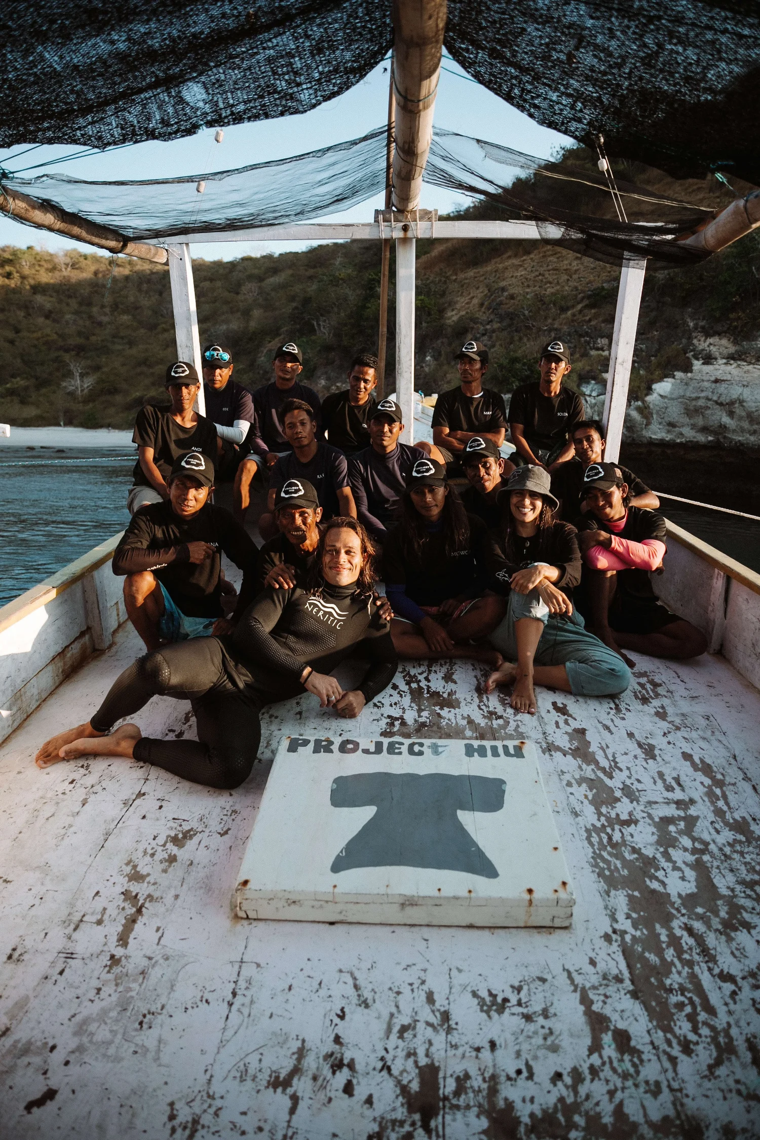 Tanner with the Project Hiu crew aboard their boat