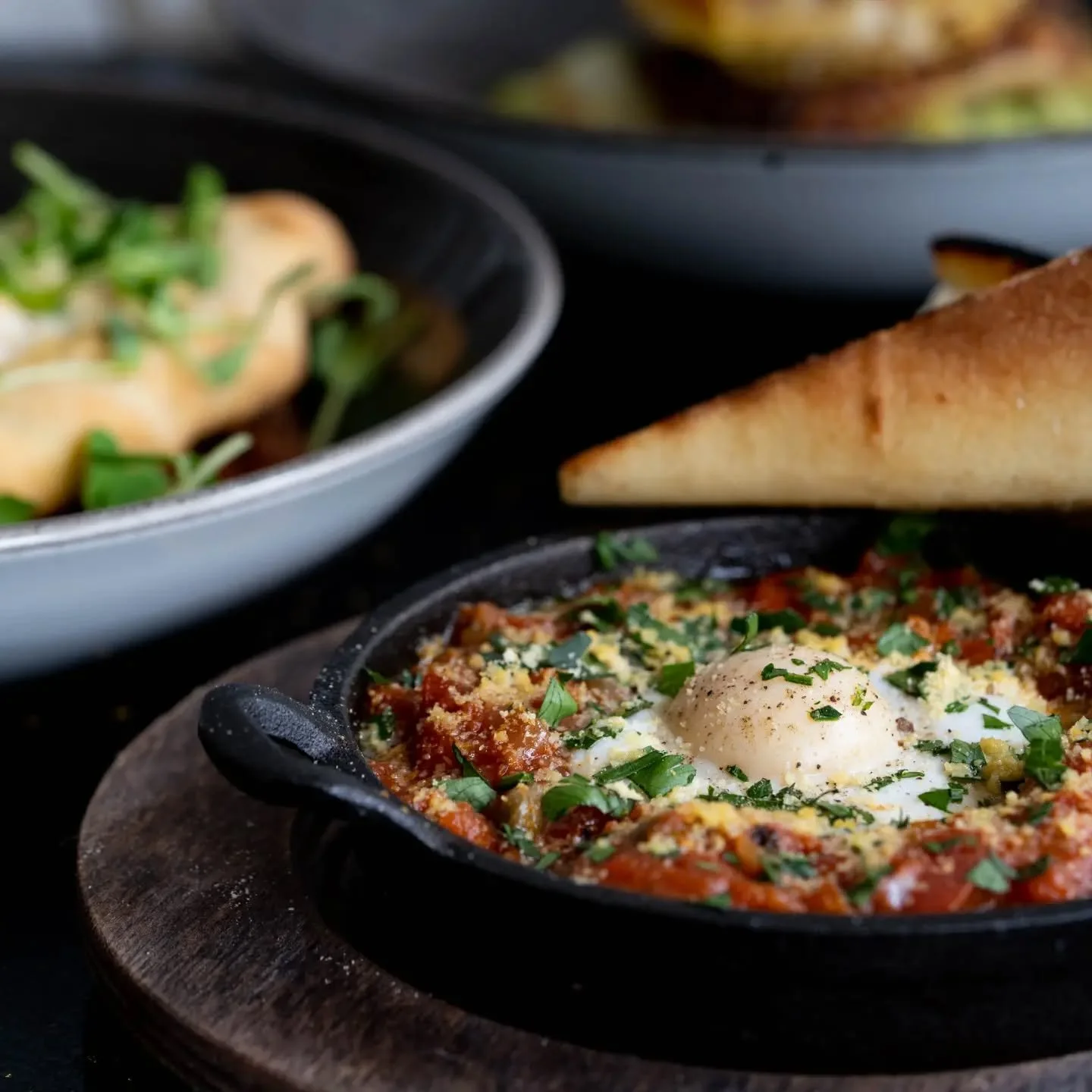 Vegan Shakshuka - fine dining style 

Sunny side up vegan eggs nestled in a rich and spicy stew of roasted pepper and fire roasted tomatoes spiked with cumin and chilies, fresh parsley, capers, crusty sourdough for dipping 

#veganfood #plantbasedfoo