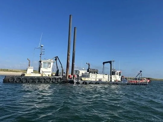 🚨 We&rsquo;re breaking ground! 🚨

After 12 years of planning and fundraising, the Longer, Wider, Deeper Spit Restoration Project is officially underway! The County Dredge has arrived in Popponesset Bay and staging has begun&mdash;making this one of