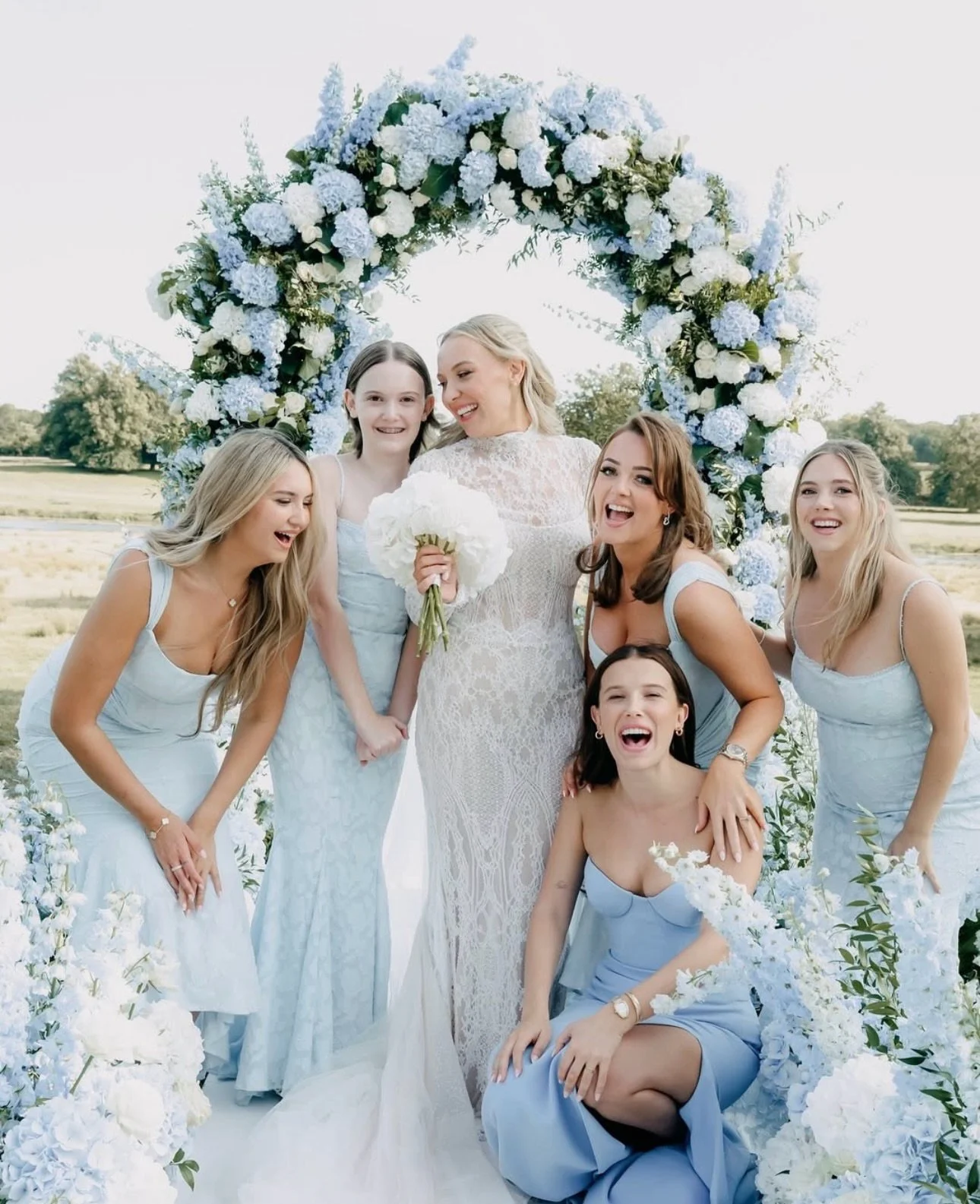 In between fighting Vecna, @milliebobbybrown helped plan her sisters gorgeous wedding! 🤍🩵💙 beautifully shot by @ejlewis 🤌🏽🤌🏽🤌🏽 

It is never just about the dress. It is about who is standing next to you.
Who would be in your circle on your w
