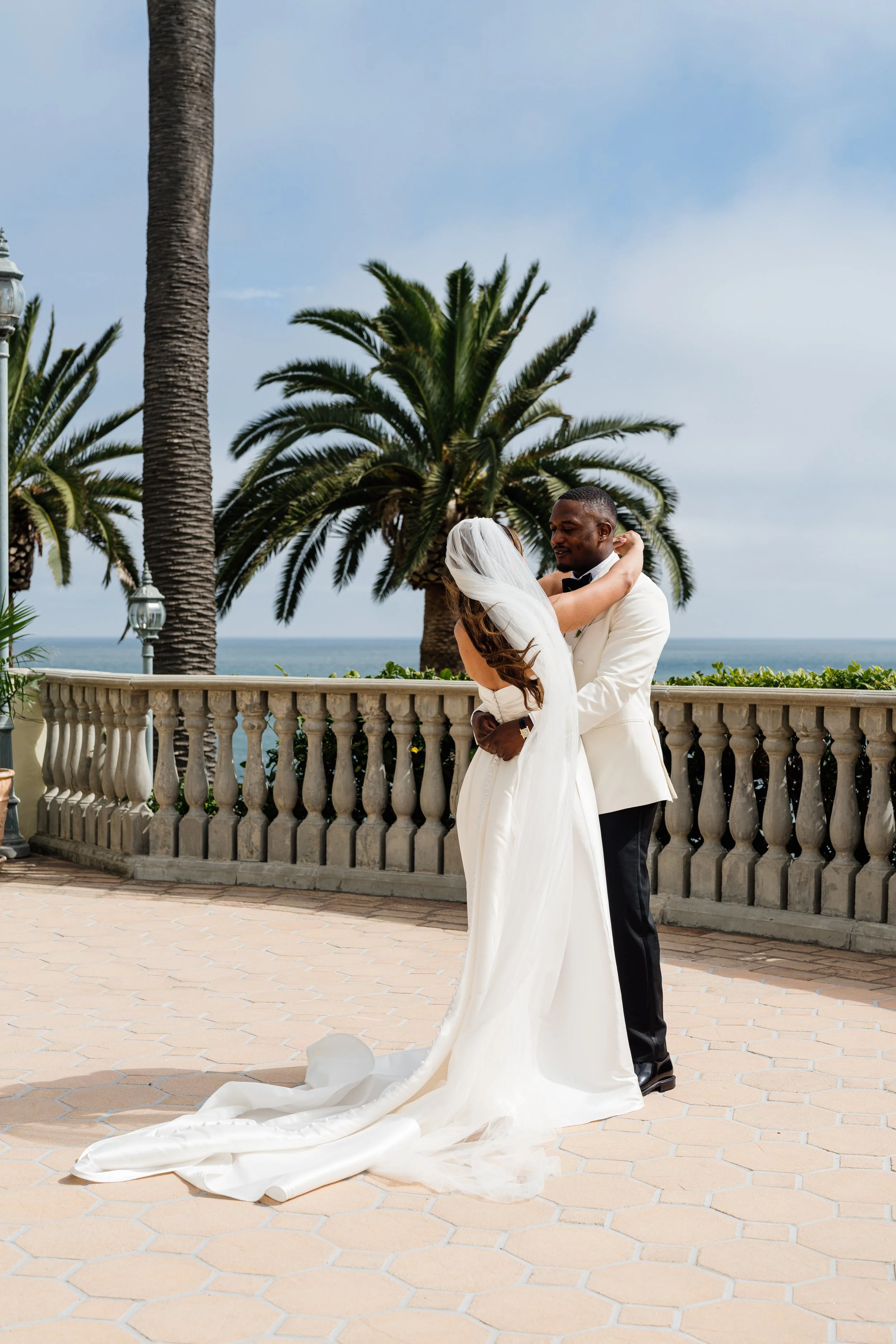 Bride and groom at Bel Air Bay Club overlooking the Pacific Ocean