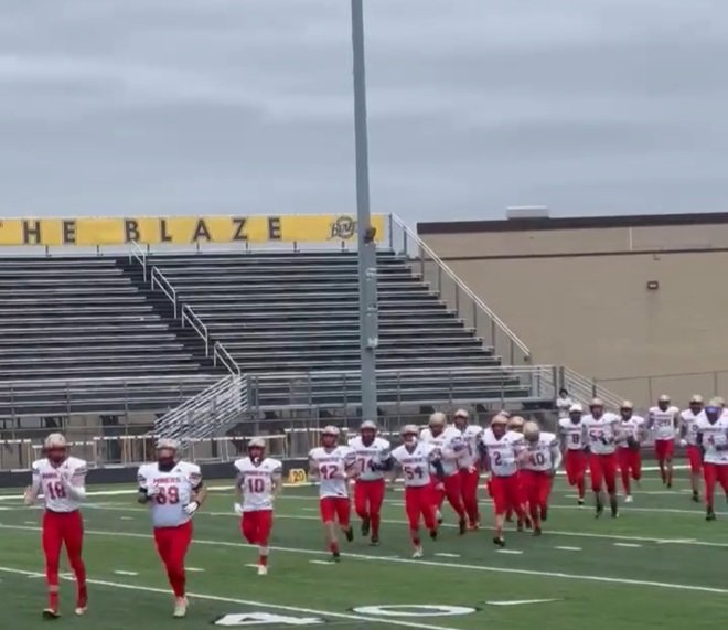 The Miners take the field to start the Miners @ Pioneers game in St. Paul, MN on May 17th. Photo Credit: Krystal Kelly