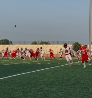 Pass attempt from #8 Larney Seals to (C) #10 Sam Jaeger during the Miners vs Pioneers game on June 14th, 2025
