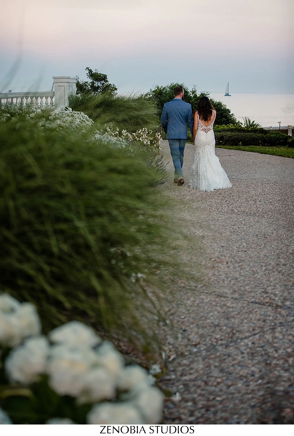 oceanhouse-exterior-portraits-on-the-path_Rosecliff_mansion_weddings_newport_ri.jpg