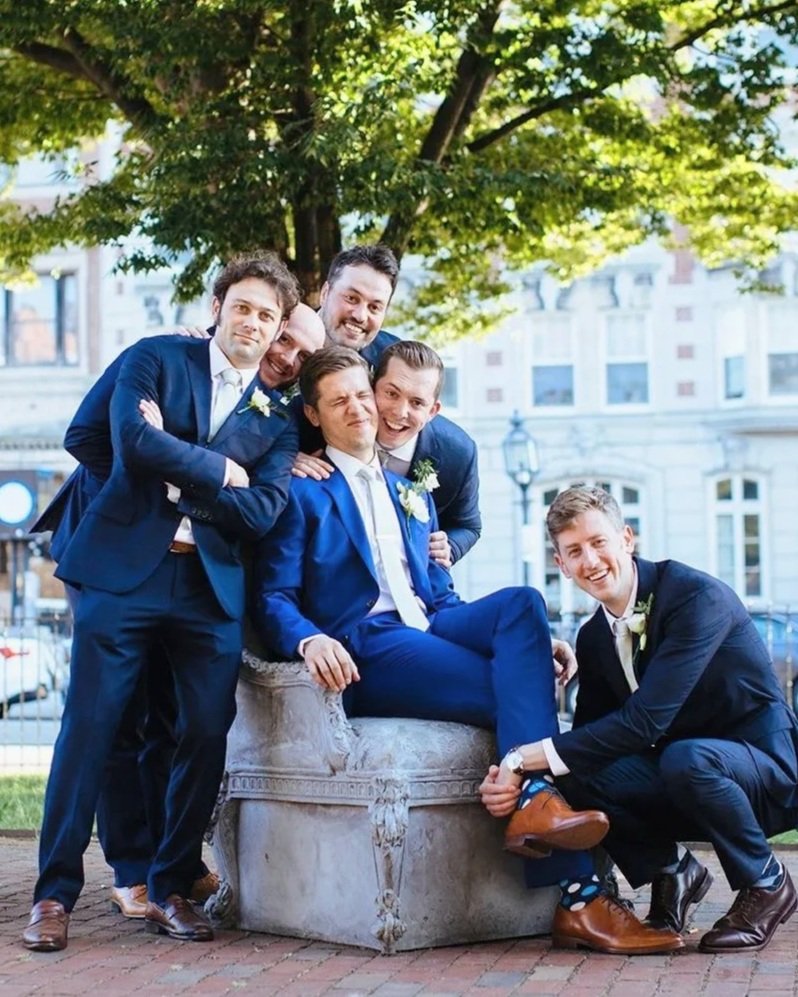 This groom and his groomsmen were hanging out outside of the Colonnade Hotel in Boston, where the wedding was taking place. We were waiting for the bride to join us for a "first look," and had planned to shoot the posed portraits of the groomsmen bef