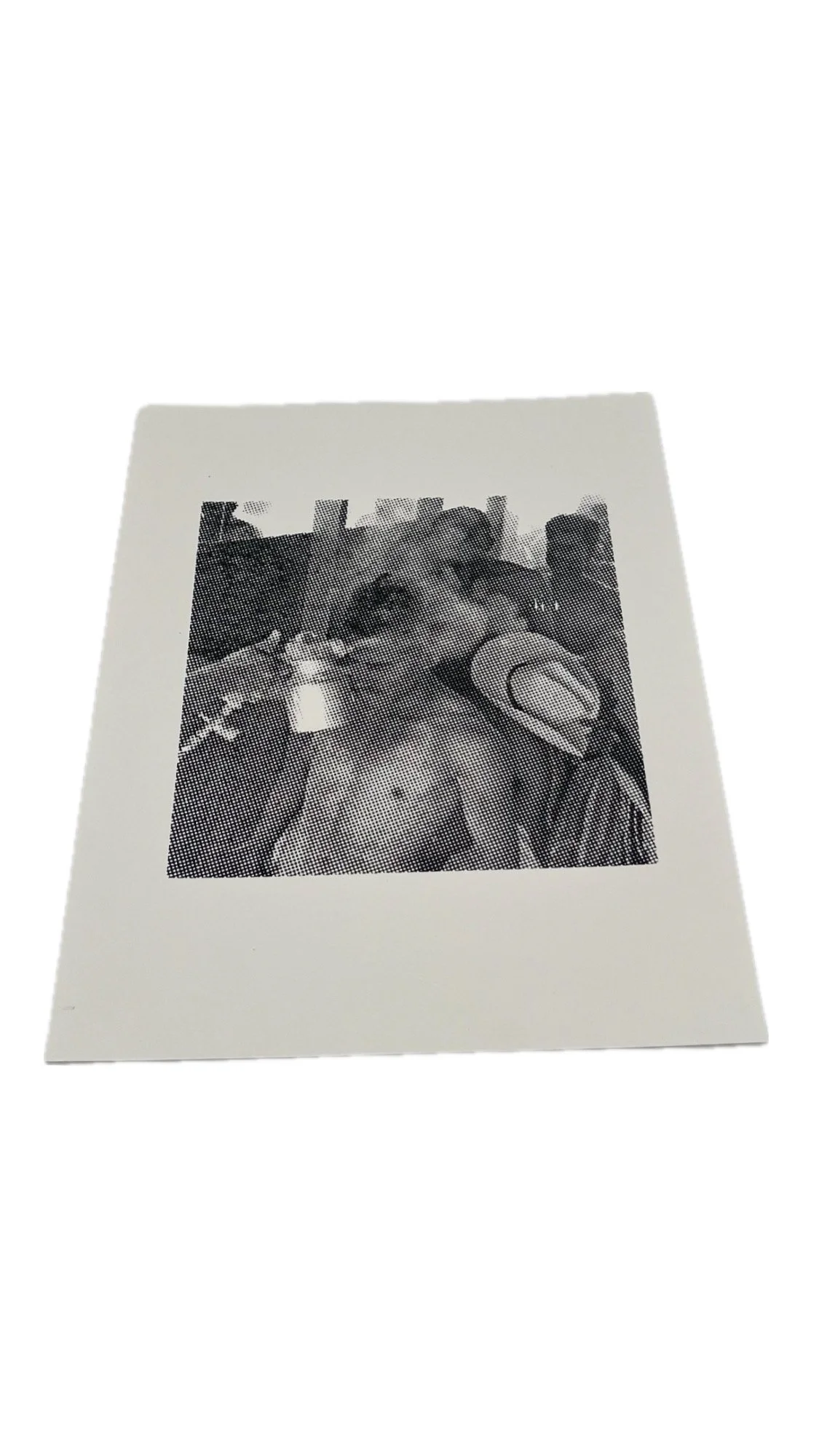 Name: Bracero Program Silk Screen Print - Black and white hand pulled screen print depicting the historic Bracero Program. In the image, a Mexican worker is being subject to chemical sanitation.  The print is unframed. (Maker: Rene Camarillo | Sugges