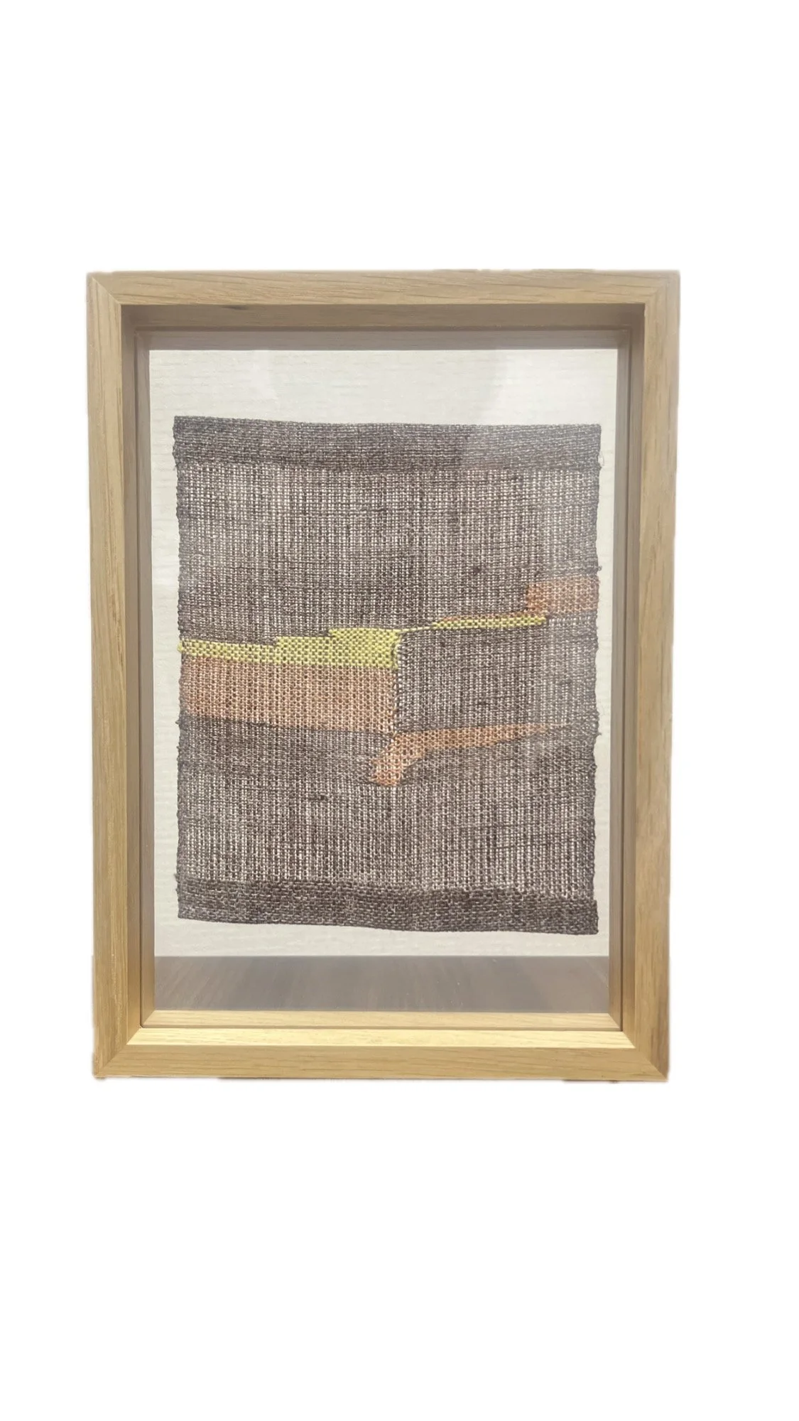 Name: Japanese Linen Mini Tapestry - Composed of Japanese Linen, this handwoven mini abstract tapestry features a simple three muted color-way.  The textile is homed in a wooden frame and in addition, the bid donor will also receive the mini wooden J