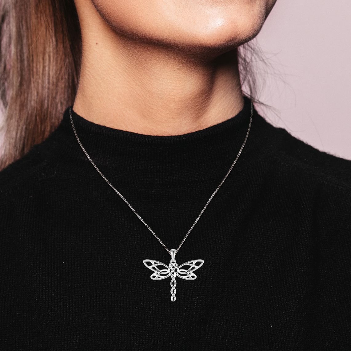 Model wearing striking dragonfly energy-jewelry-pendant
