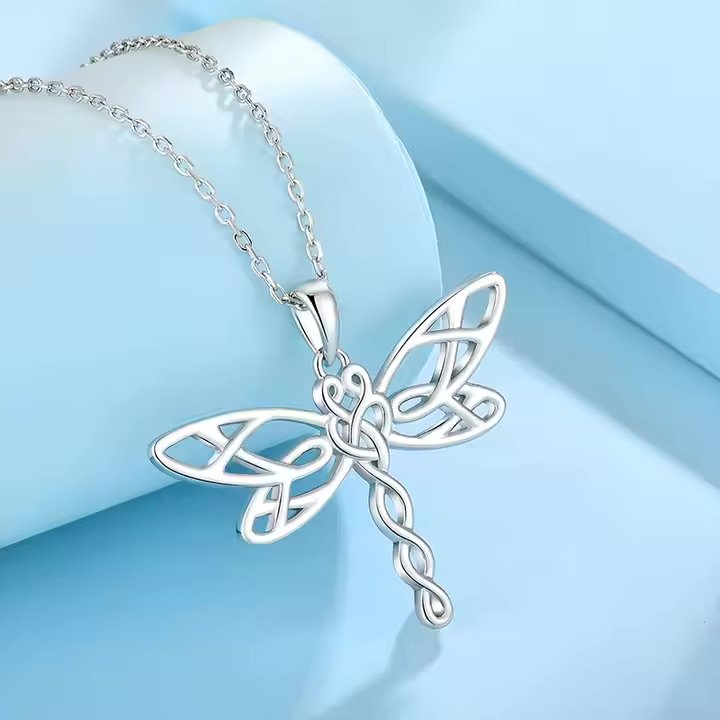 A unique pience of frequency jewelry in the shape of a dragonfly.