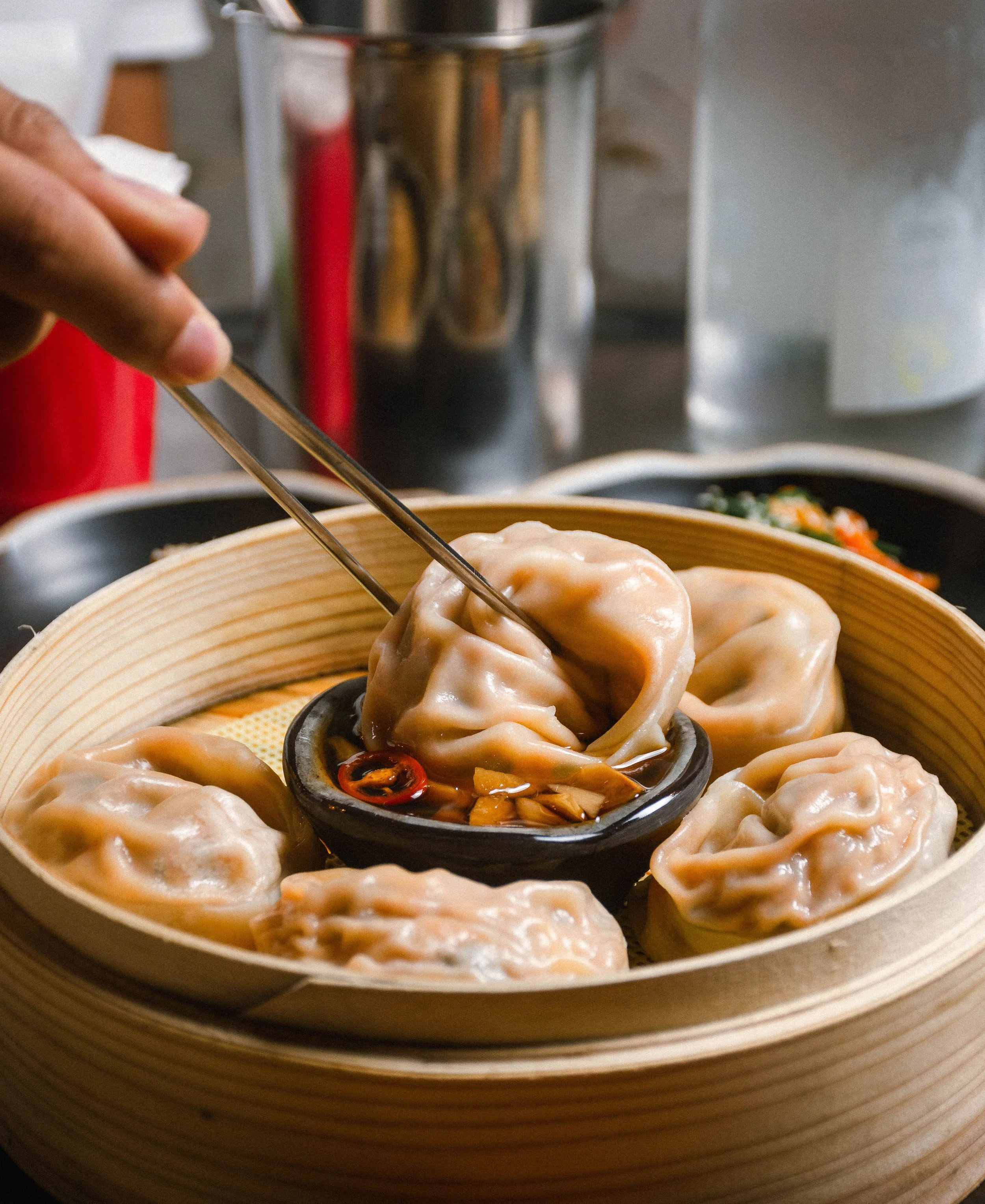 Kimchi Mandoo in Dipping Sauce